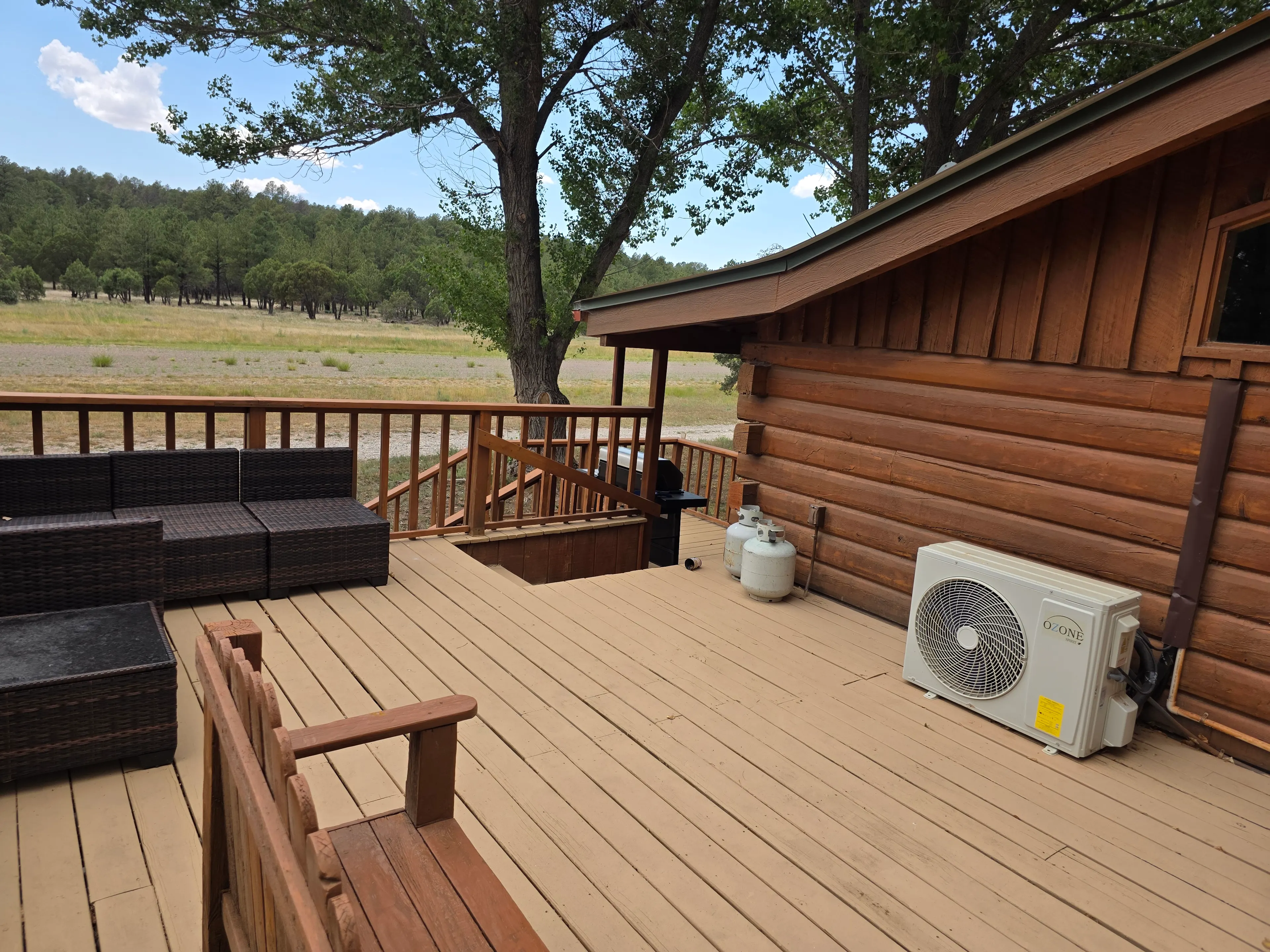 large deck with outdoor seating