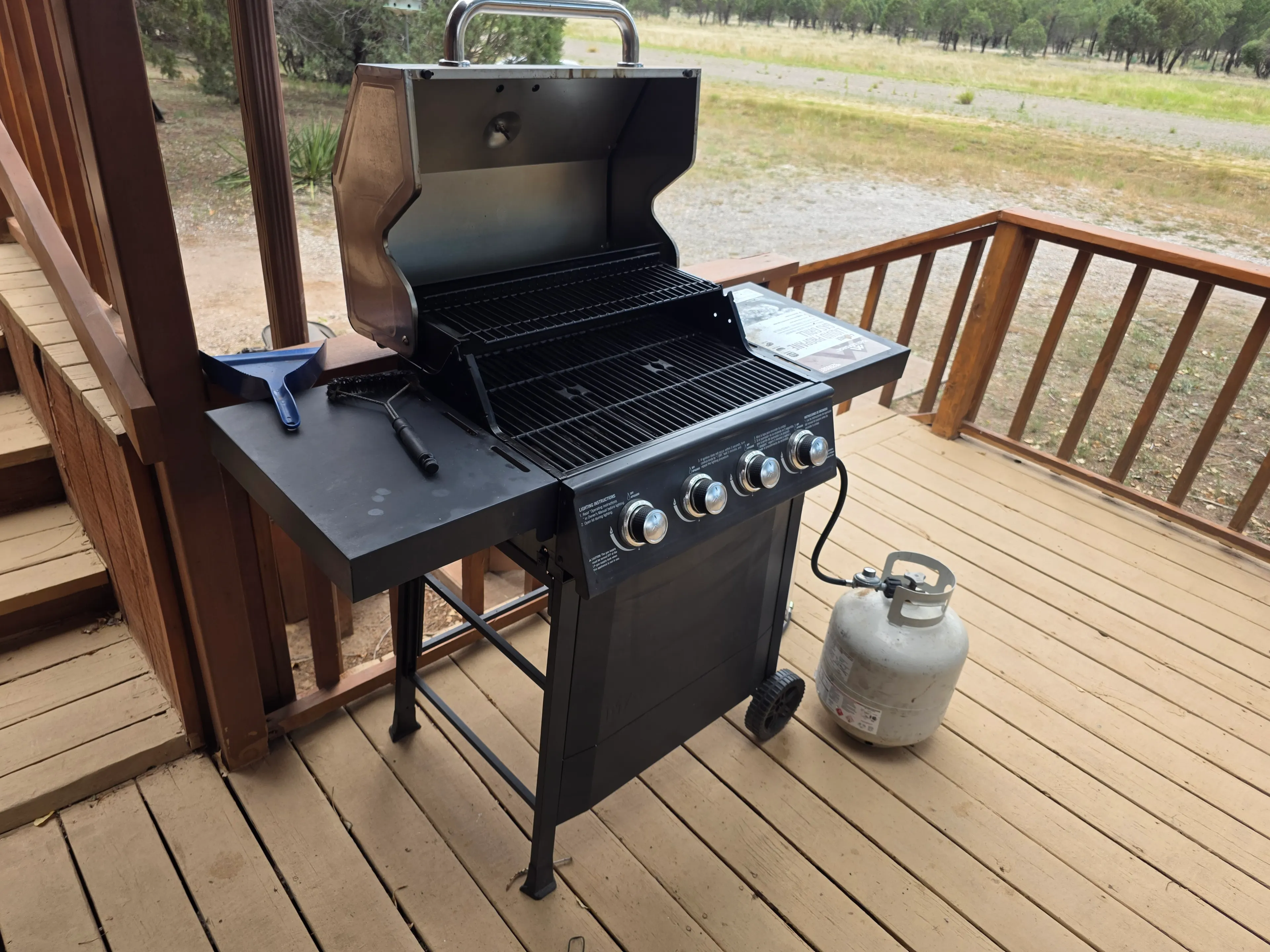 gas grill open on deck
