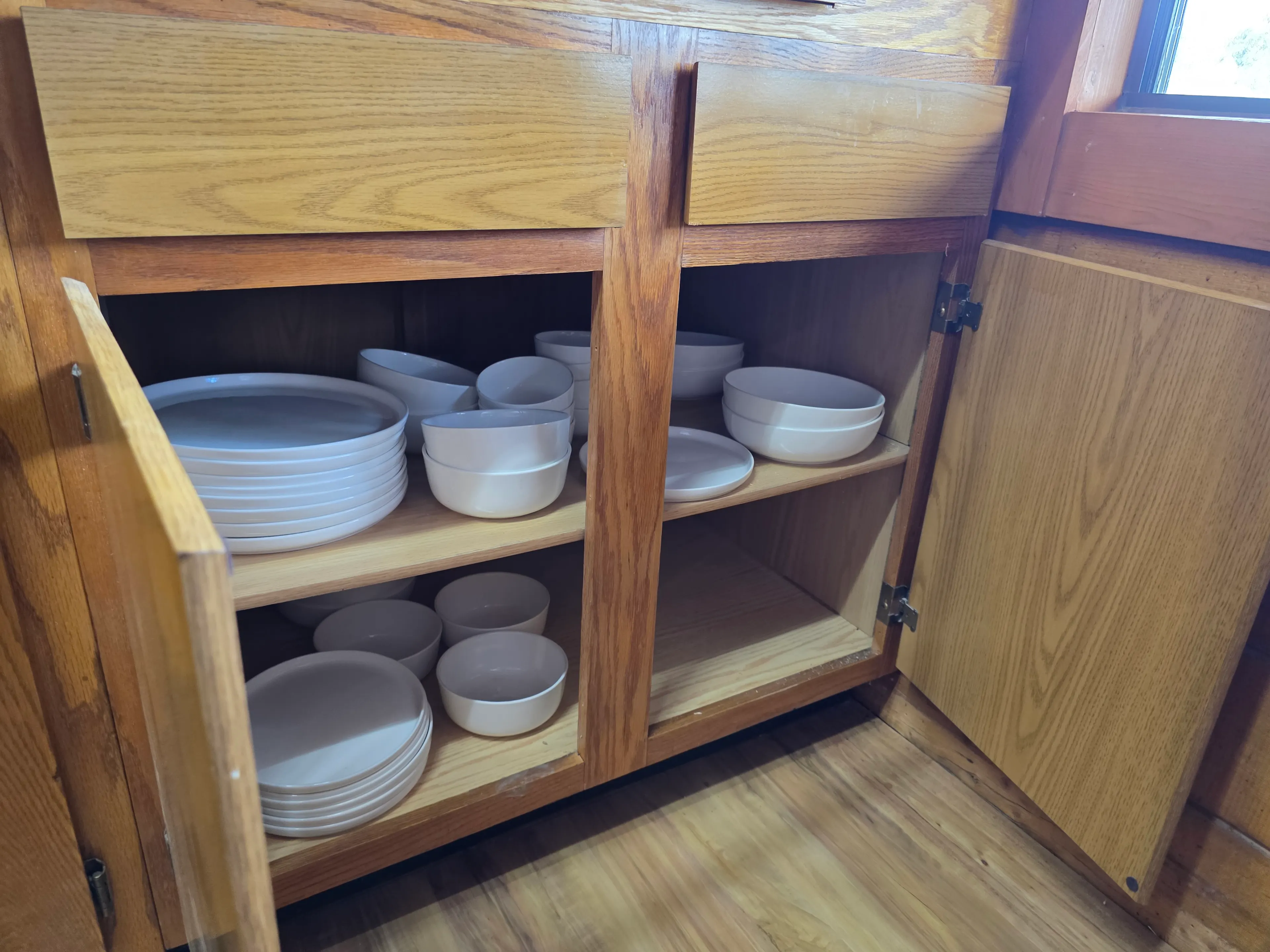 Cabinet stocked with dishware