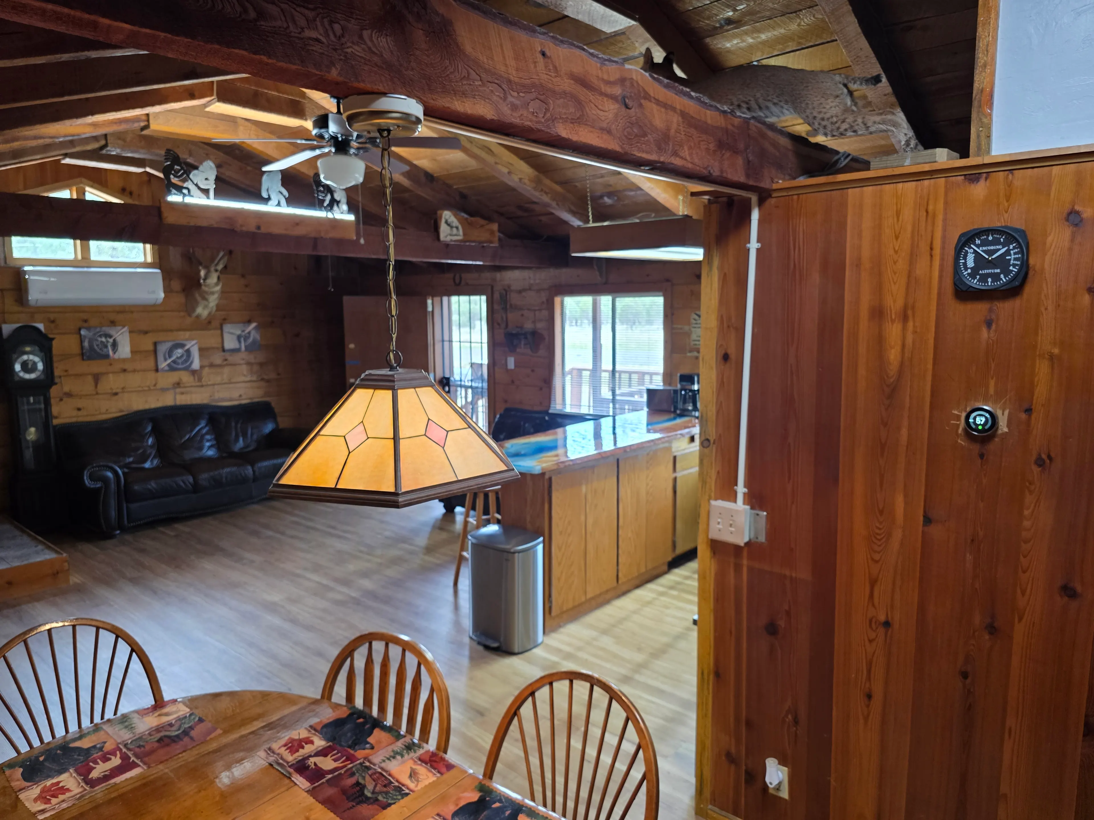 Wide view living-kitchen from dining