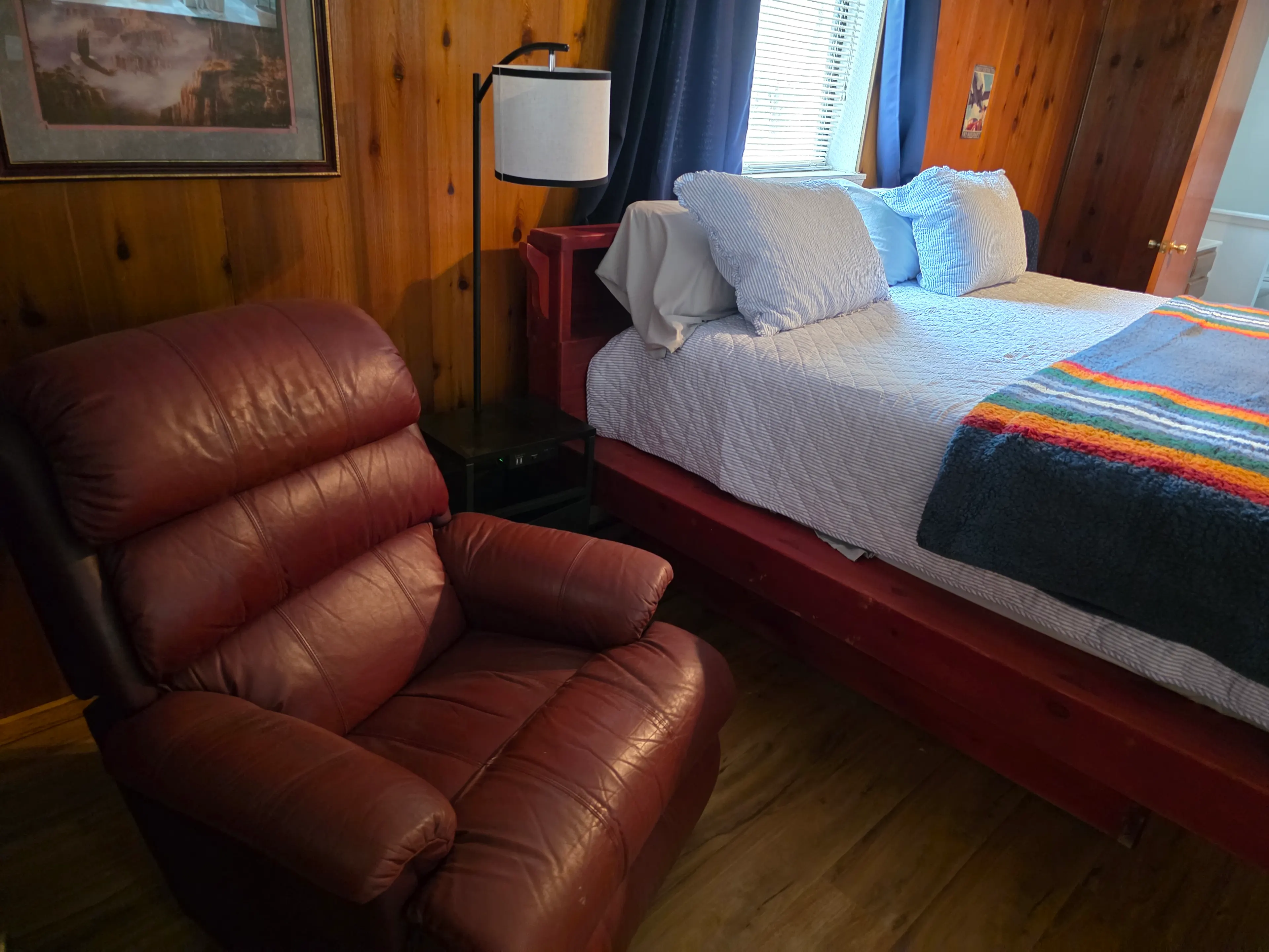 bedroom with leather recliner