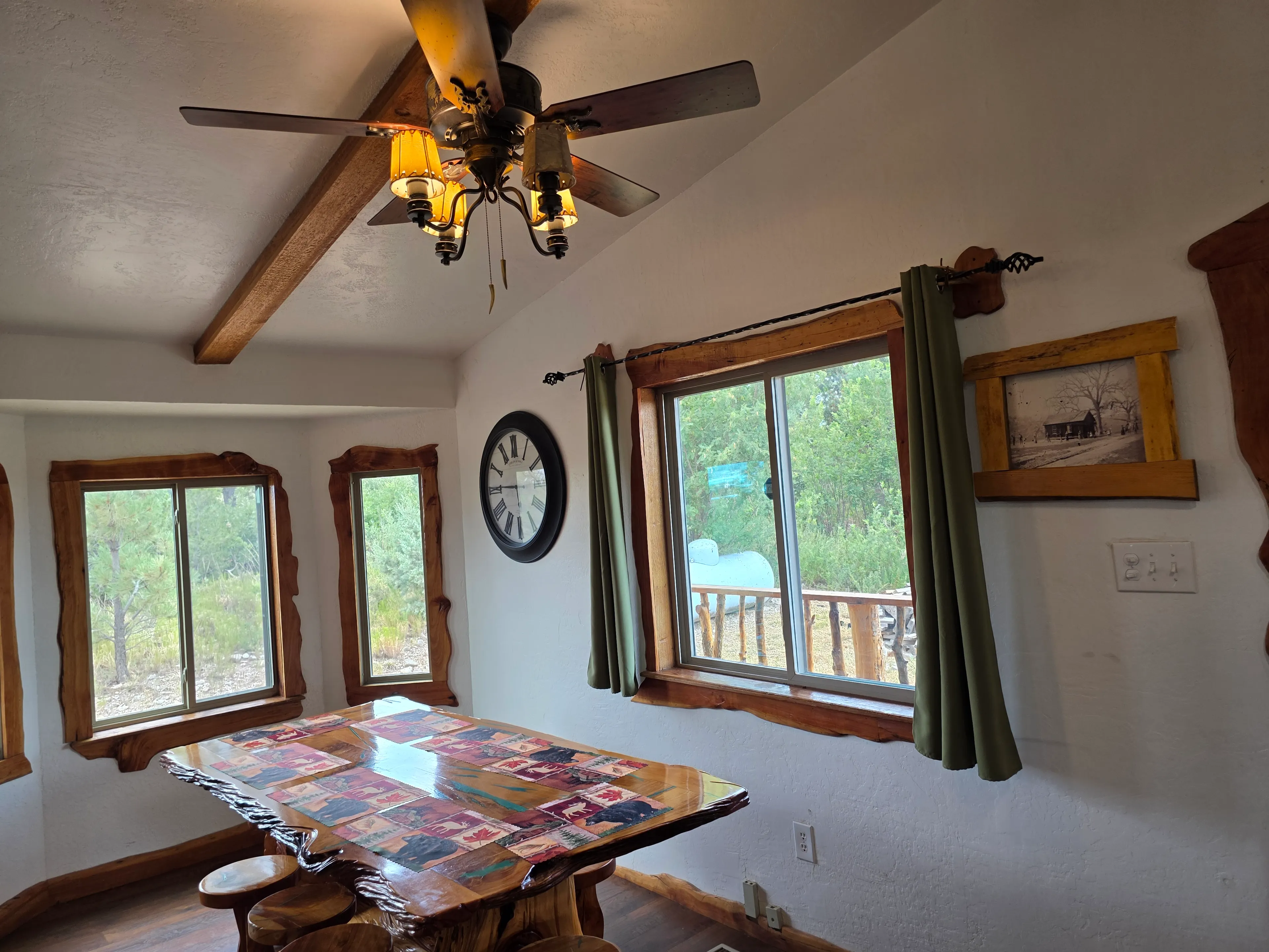 rustic dining table by windows