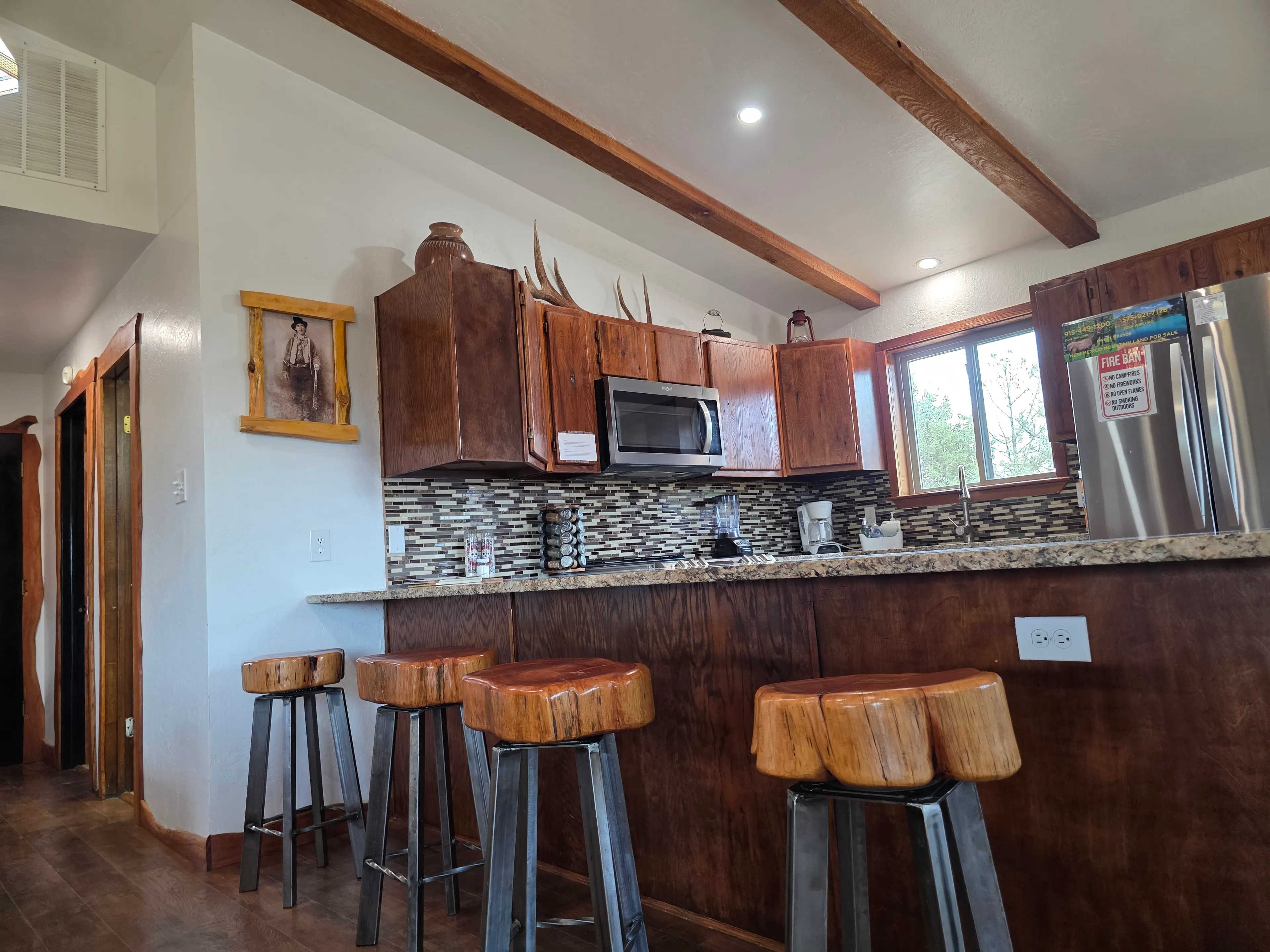 kitchen bar with log stools