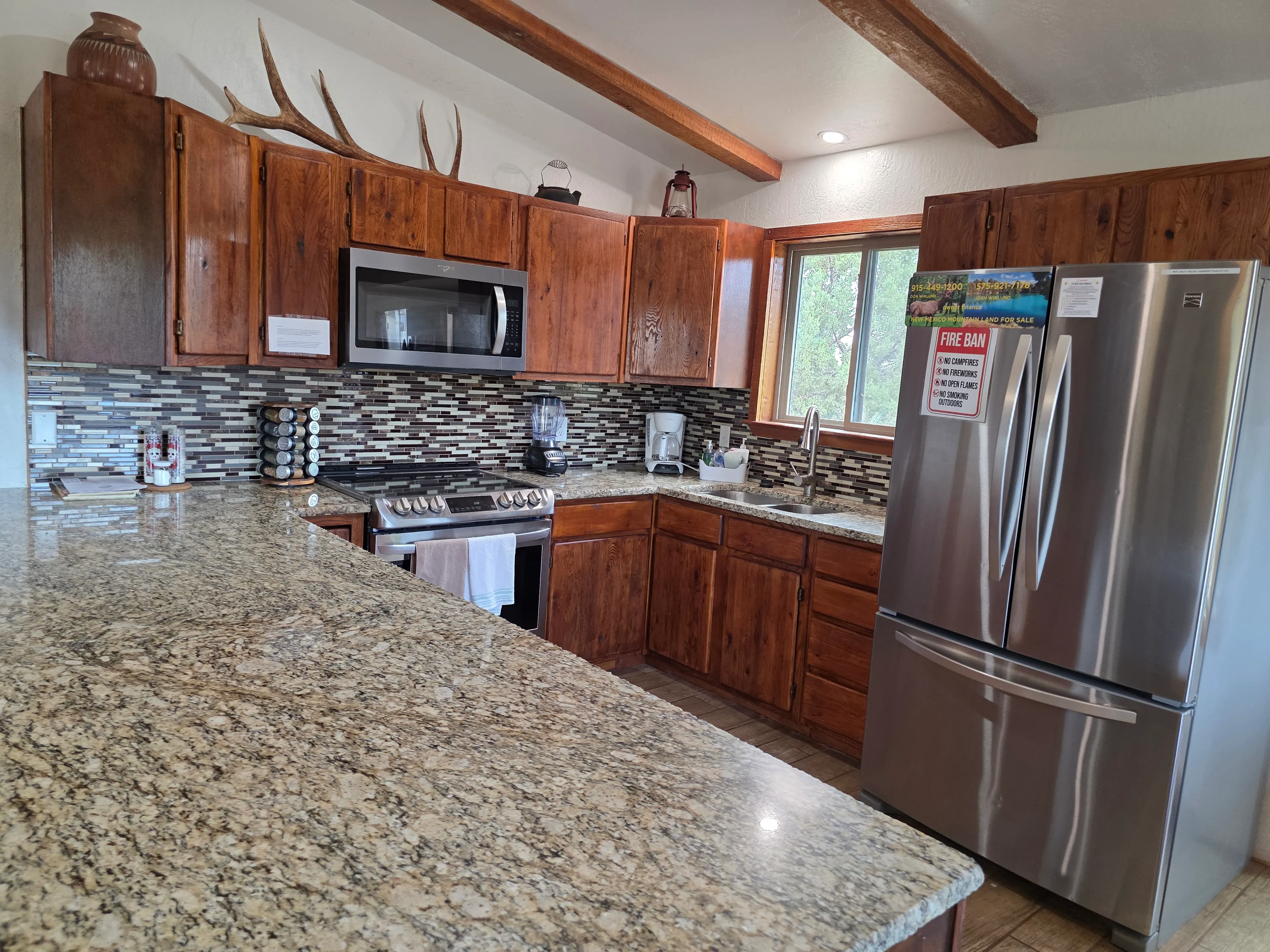 full kitchen with stainless appliances