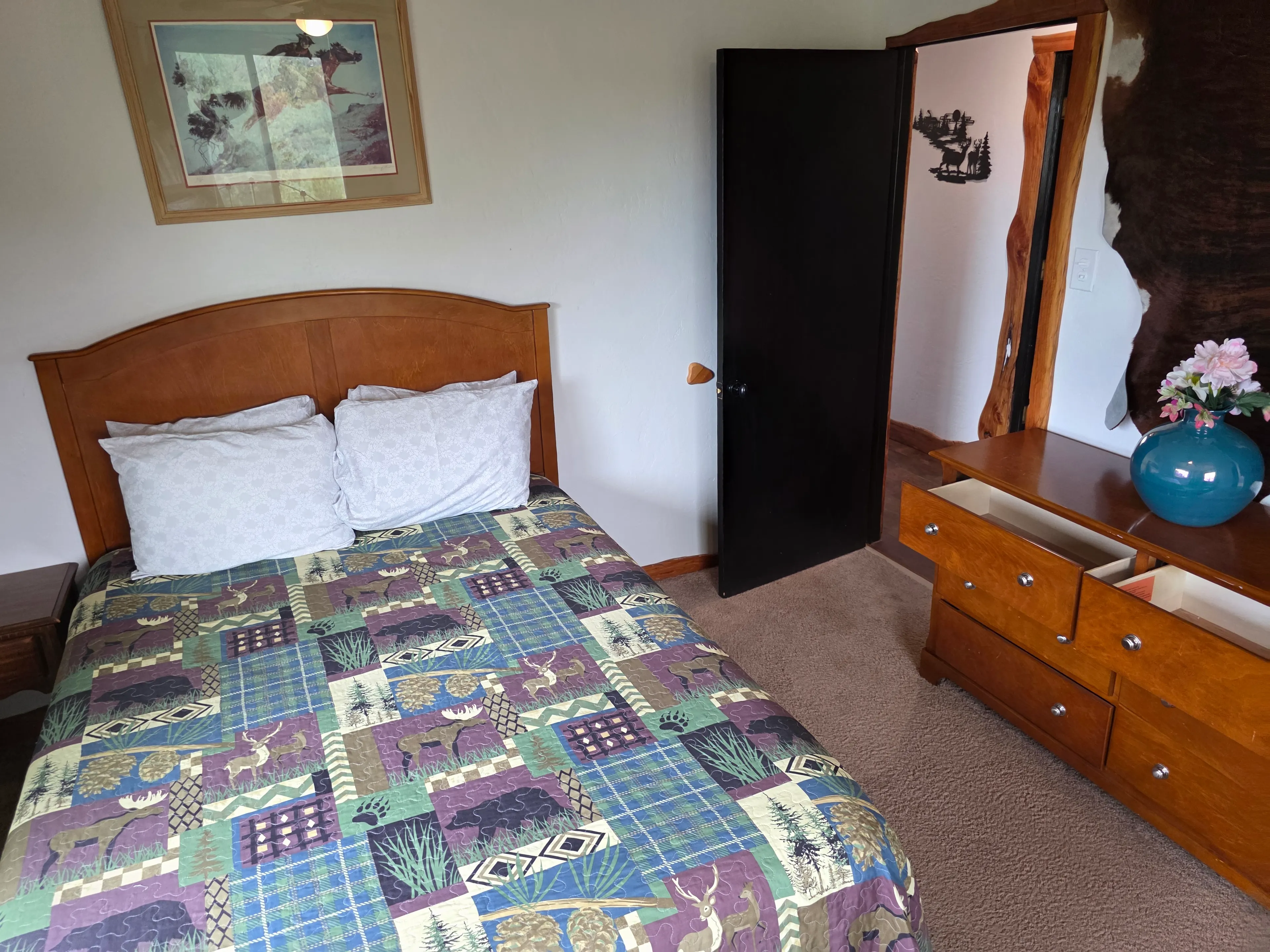 queen bed and wood dresser