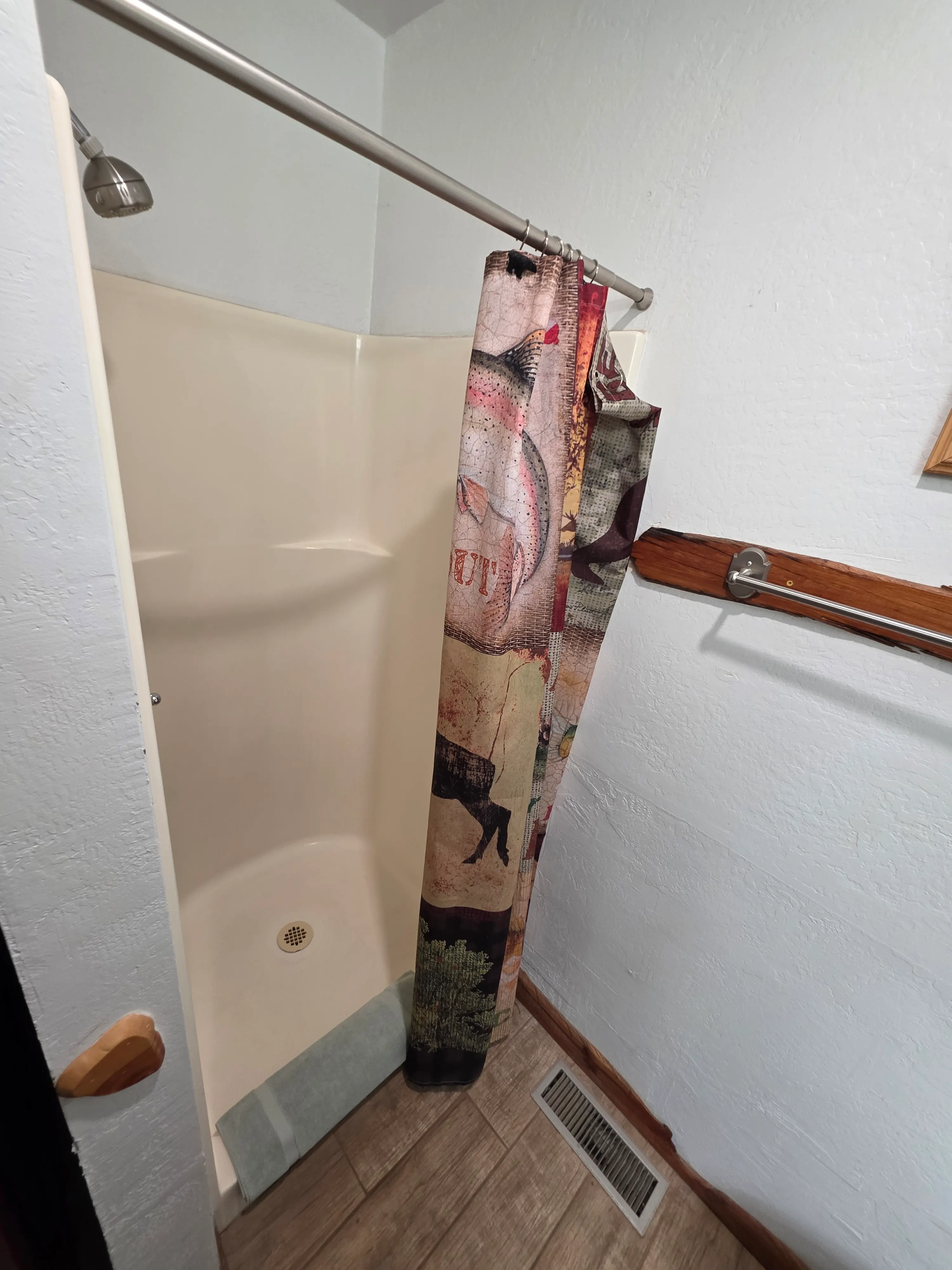 Shower stall with trout curtain