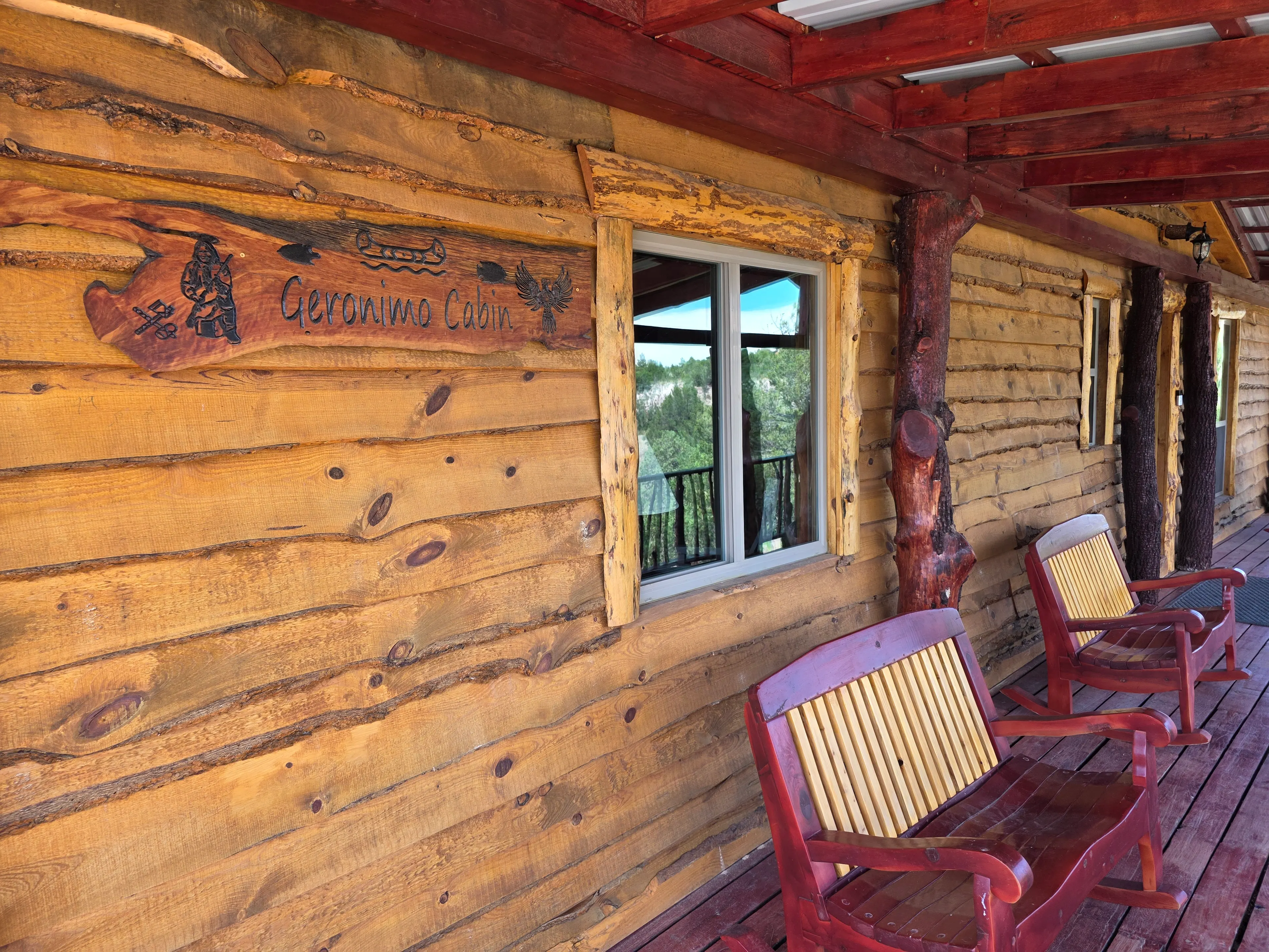 Geronimo Cabin sign on porch wall