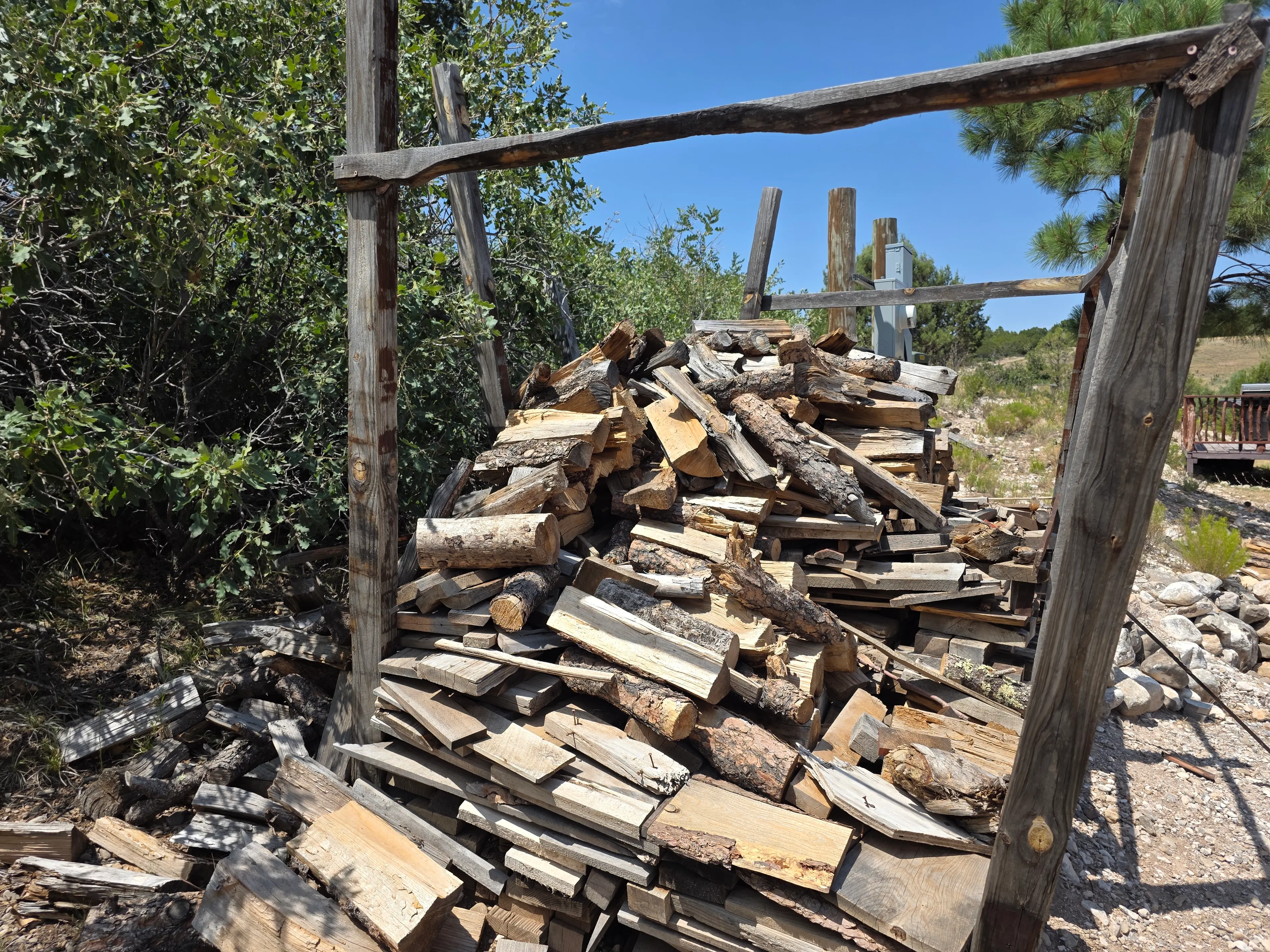 Large firewood pile in rack