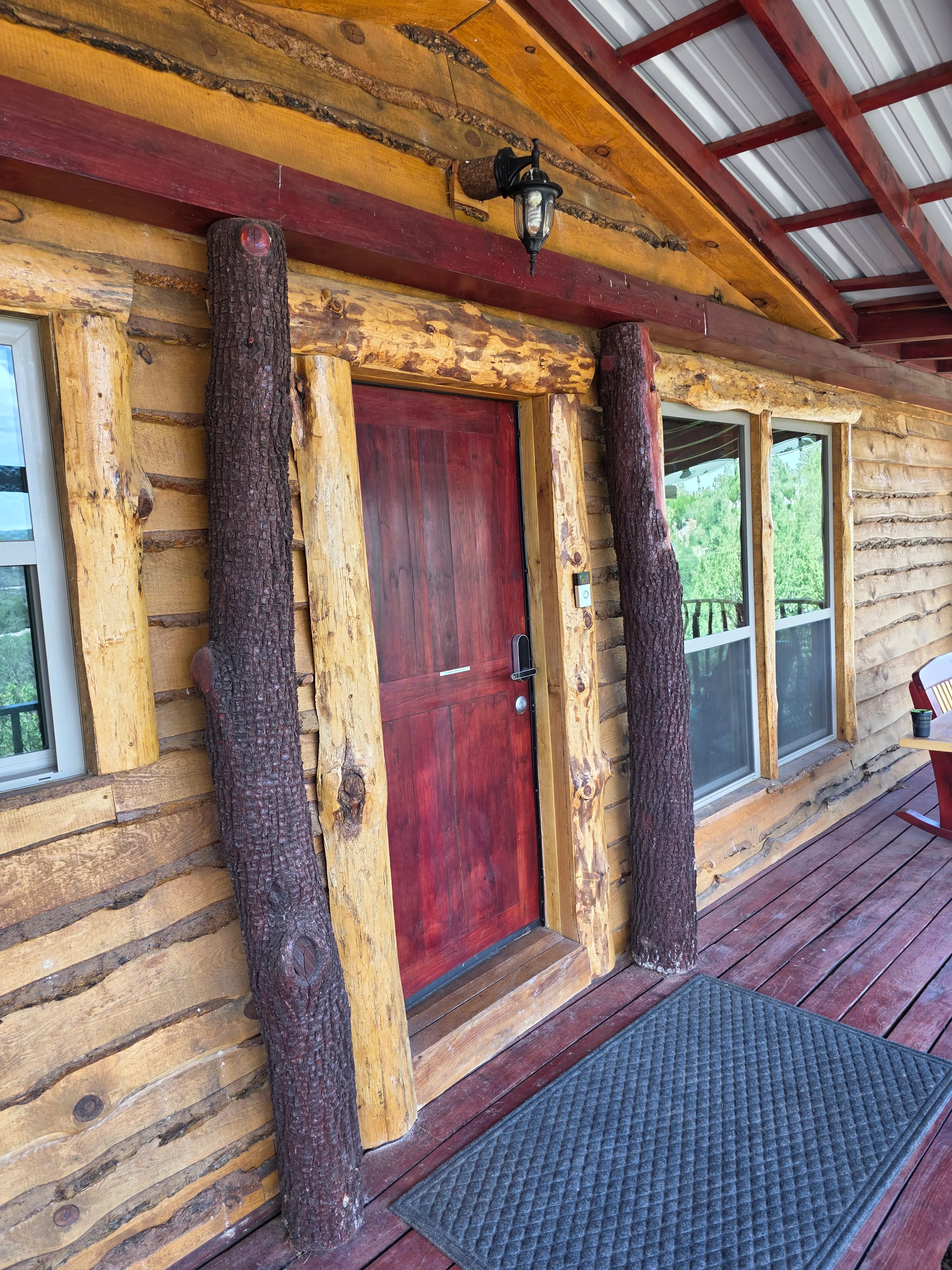 Red front door, log posts