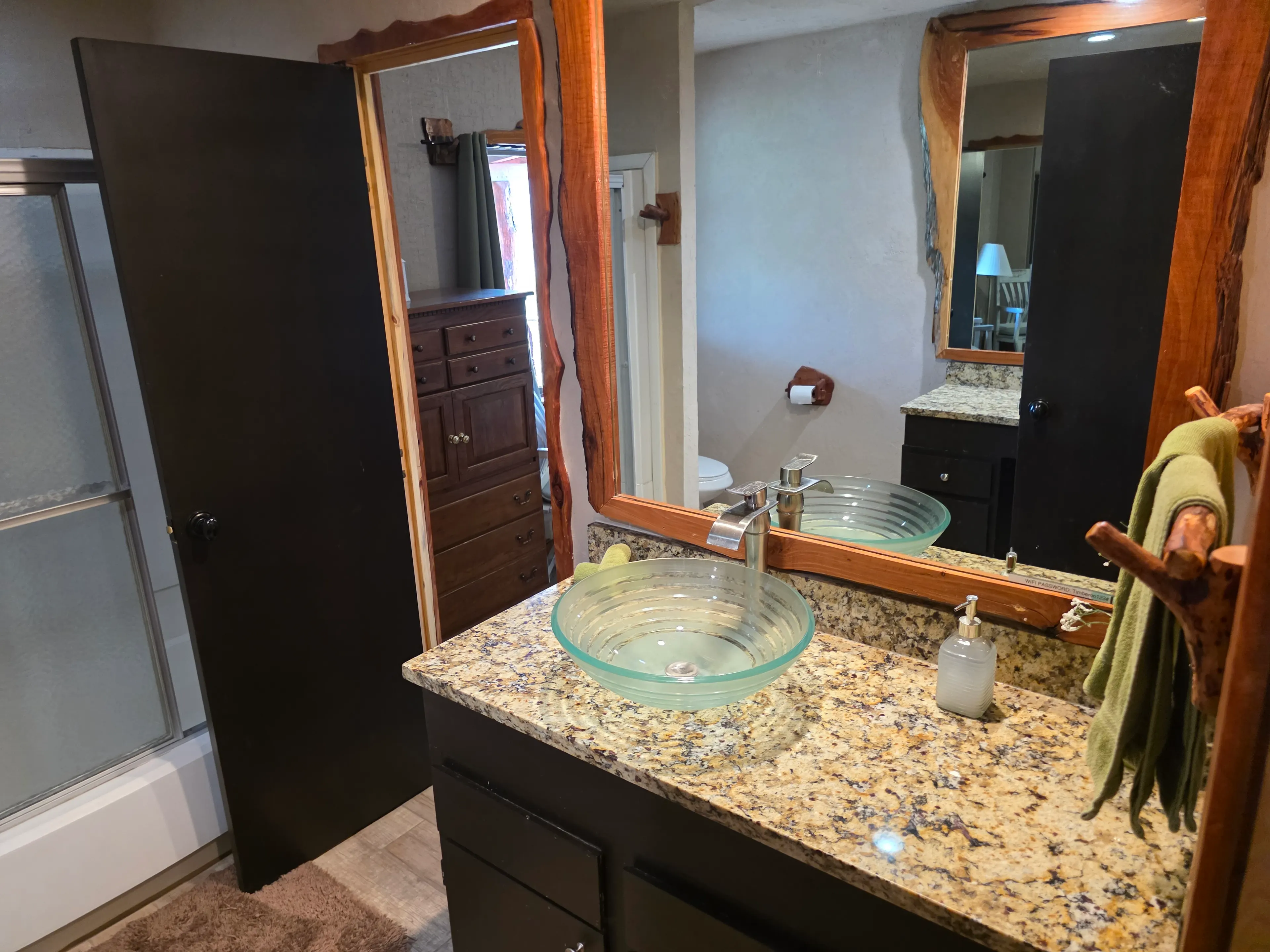 vanity with glass vessel sink