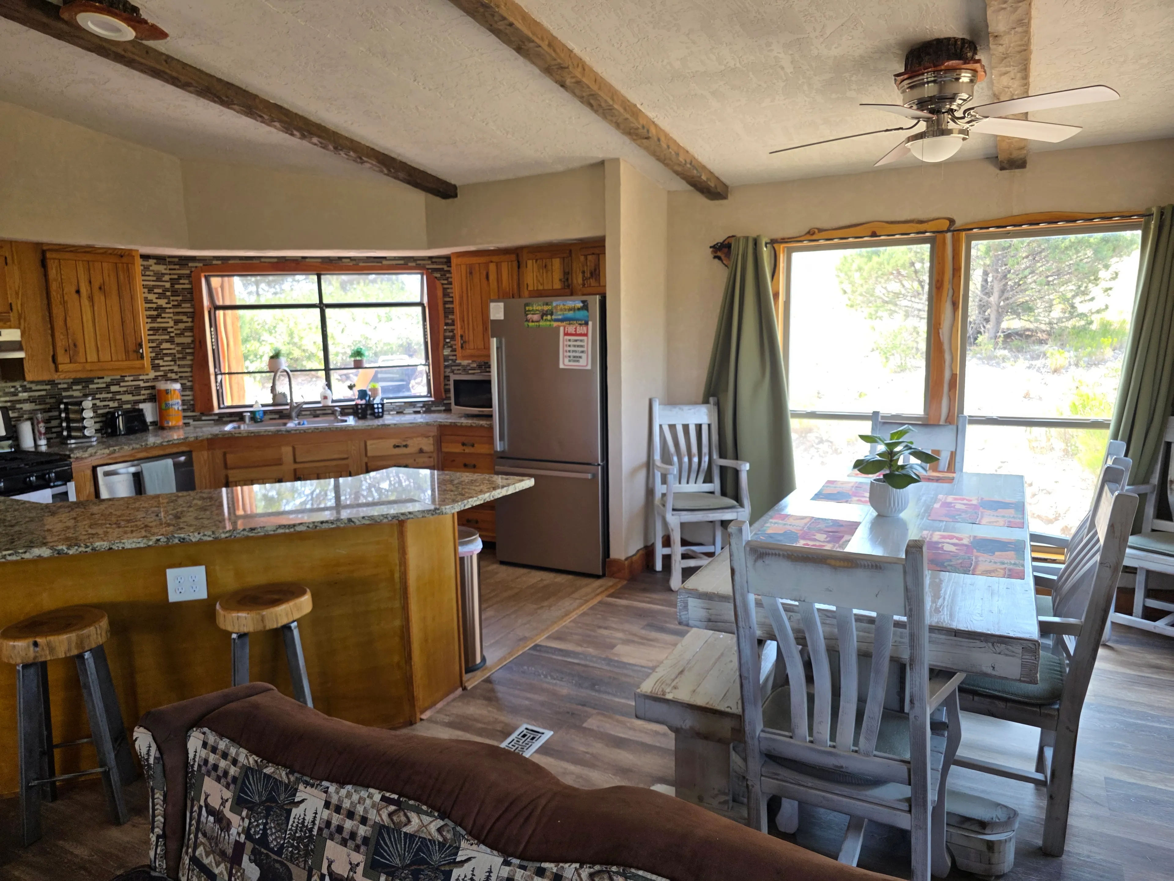 Kitchen with island and dining