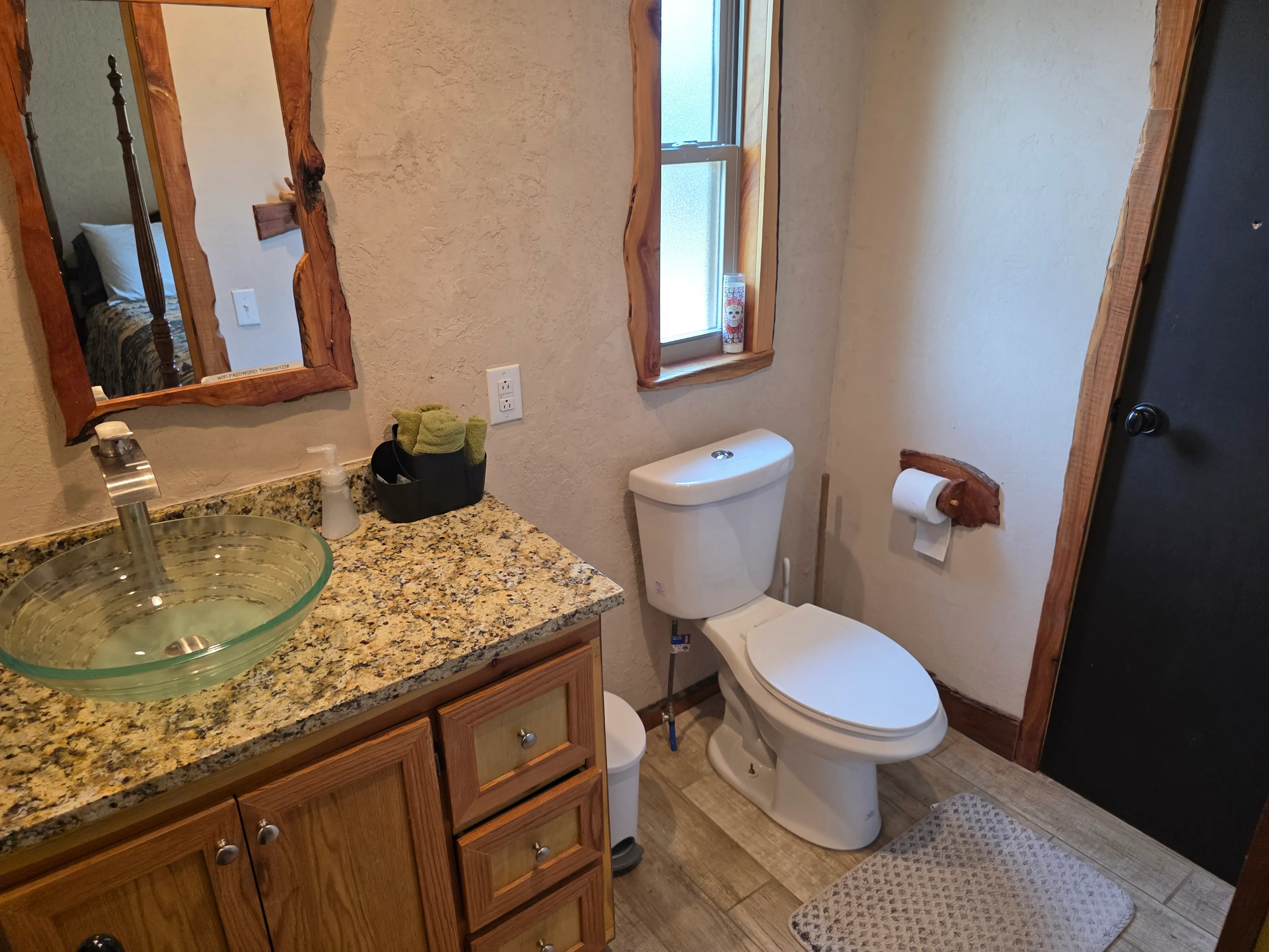 Bathroom vanity, glass sink, toilet