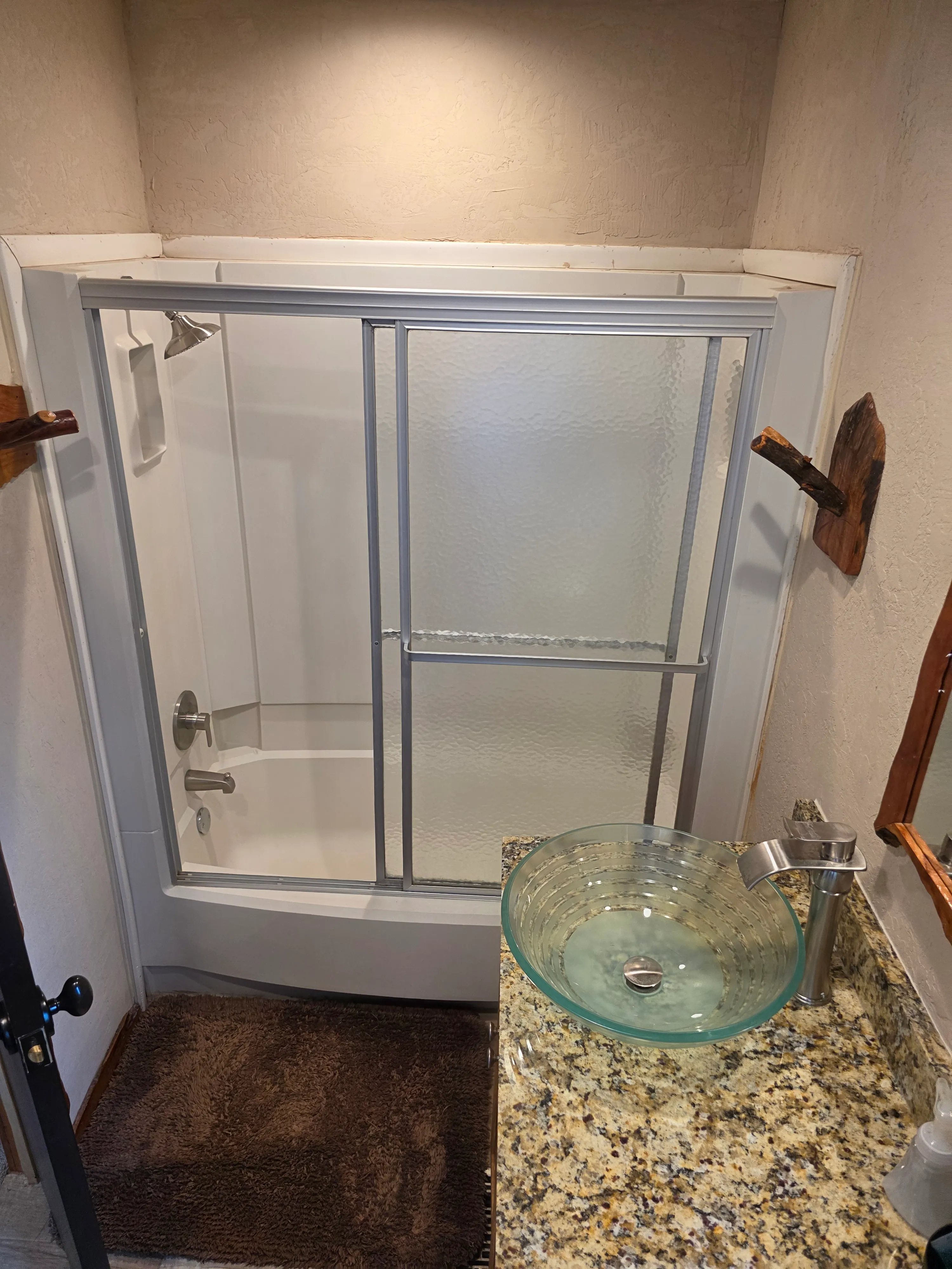 Tub shower with sliding doors