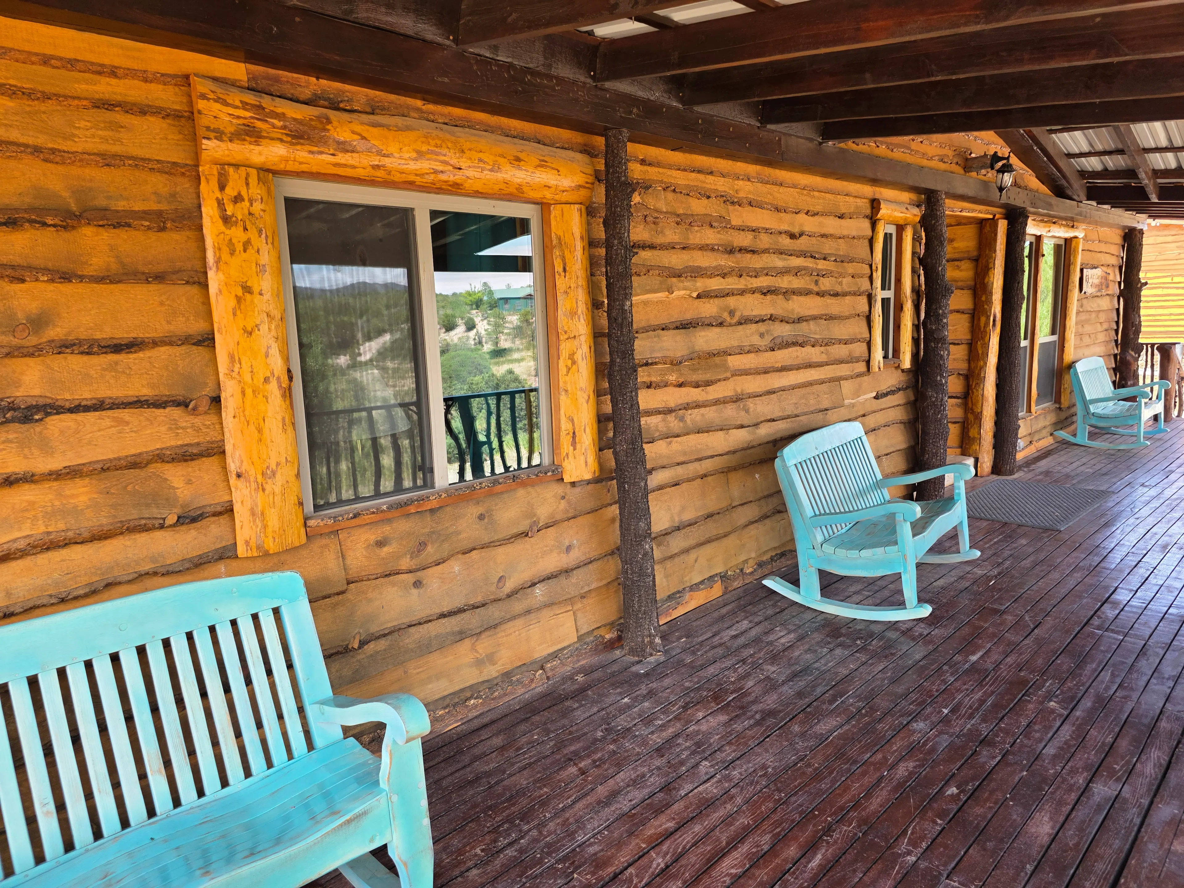 Long covered porch with rockers