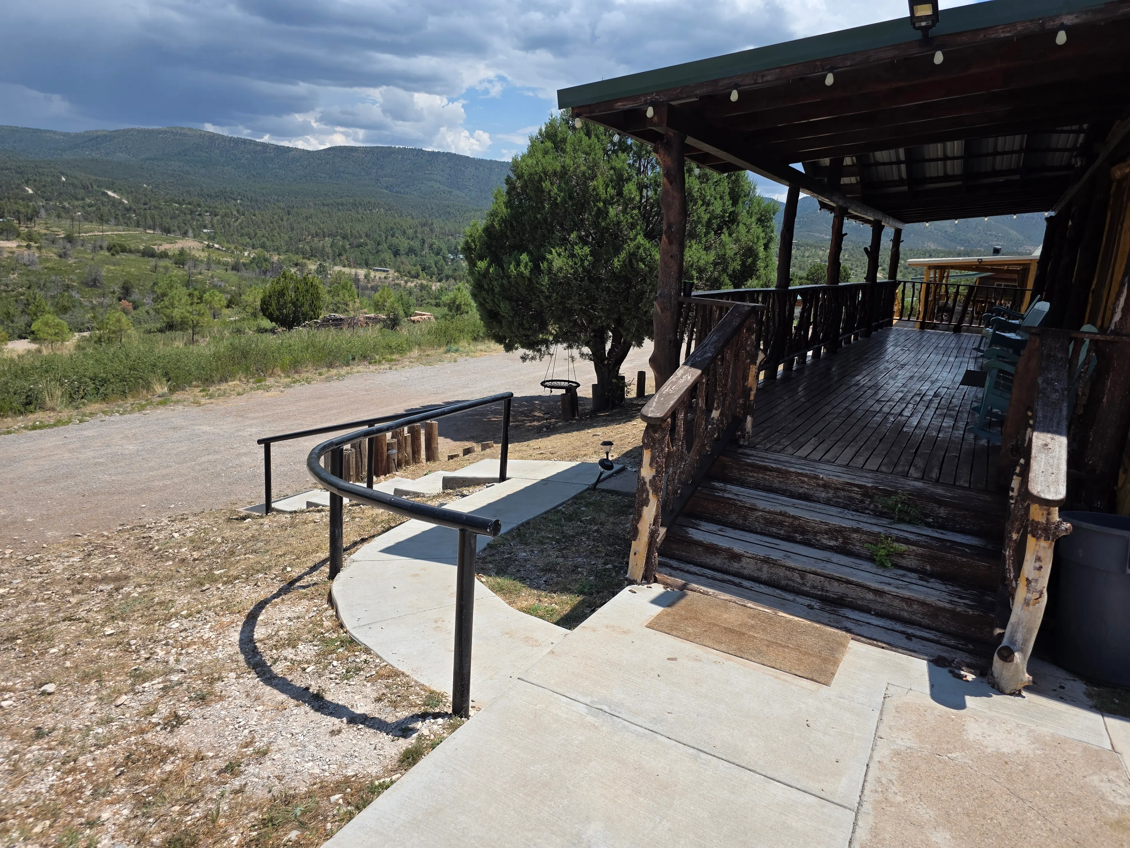 Porch steps, mountain valley view