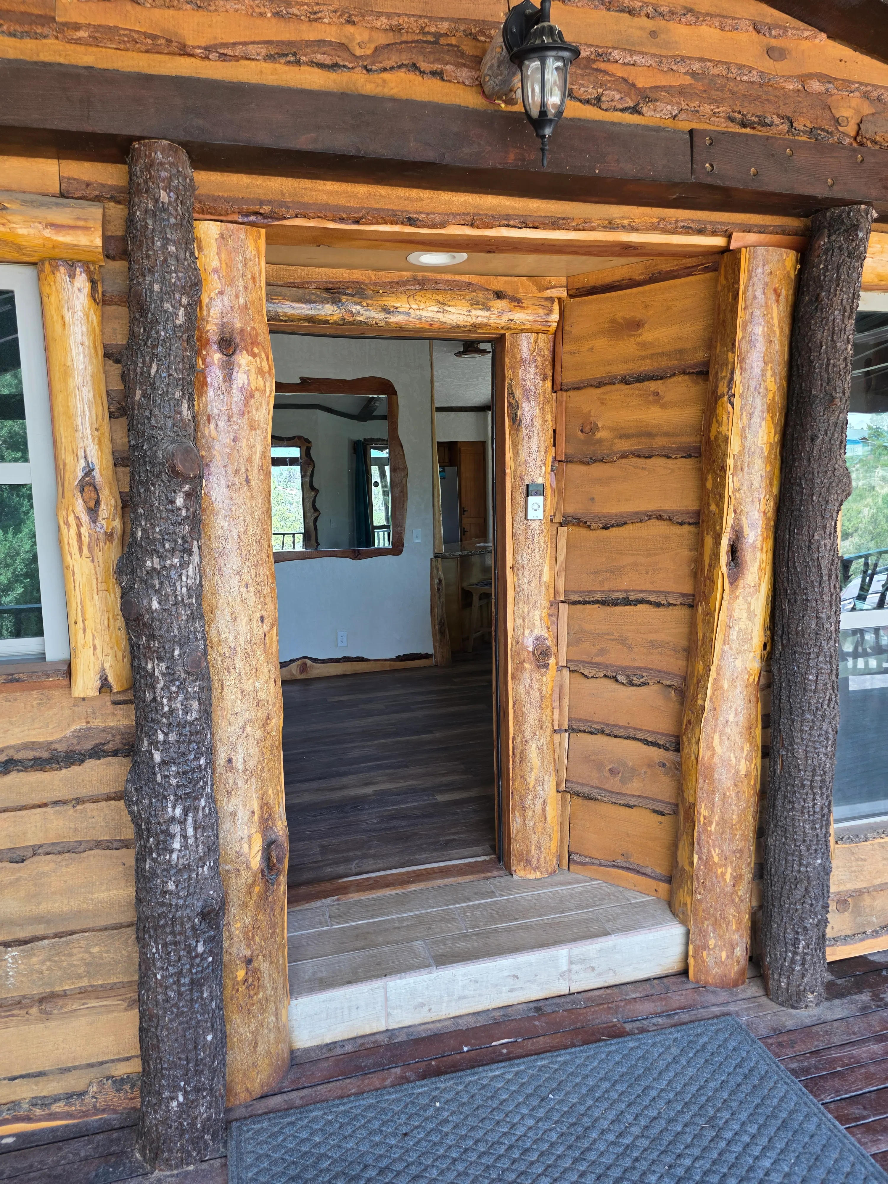 Open front door into cabin