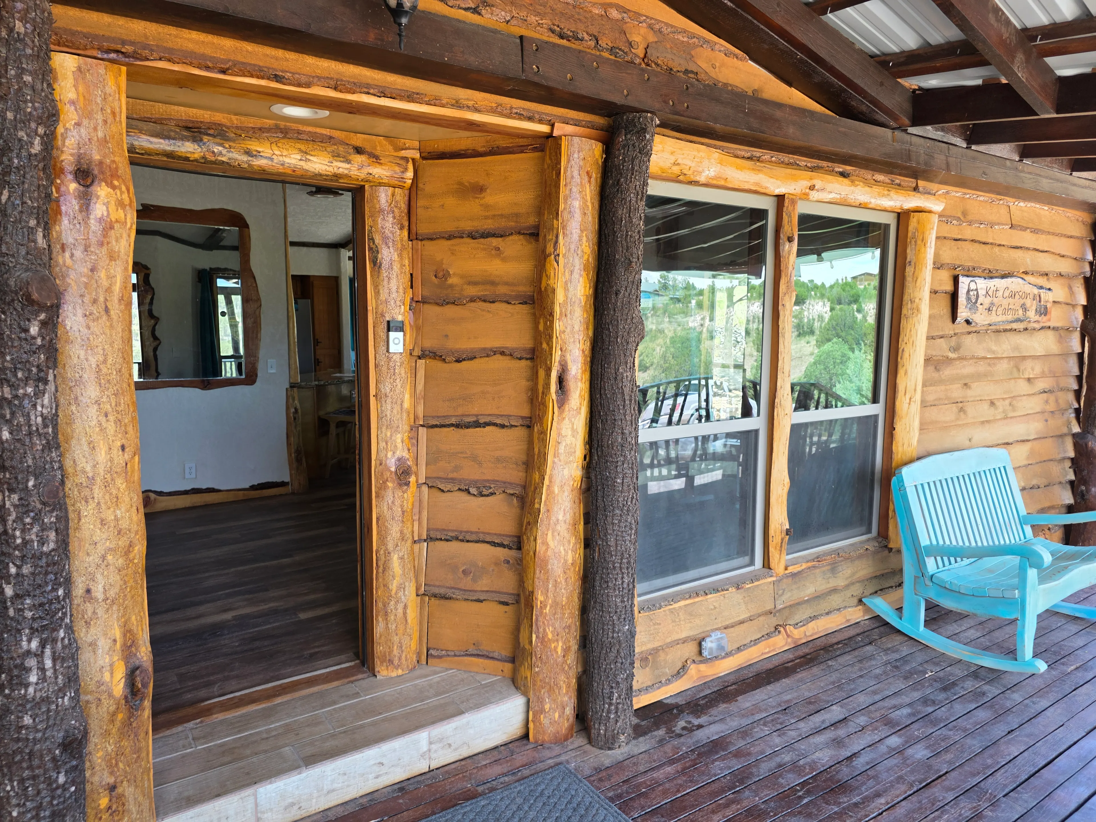 Porch entry, name sign visible