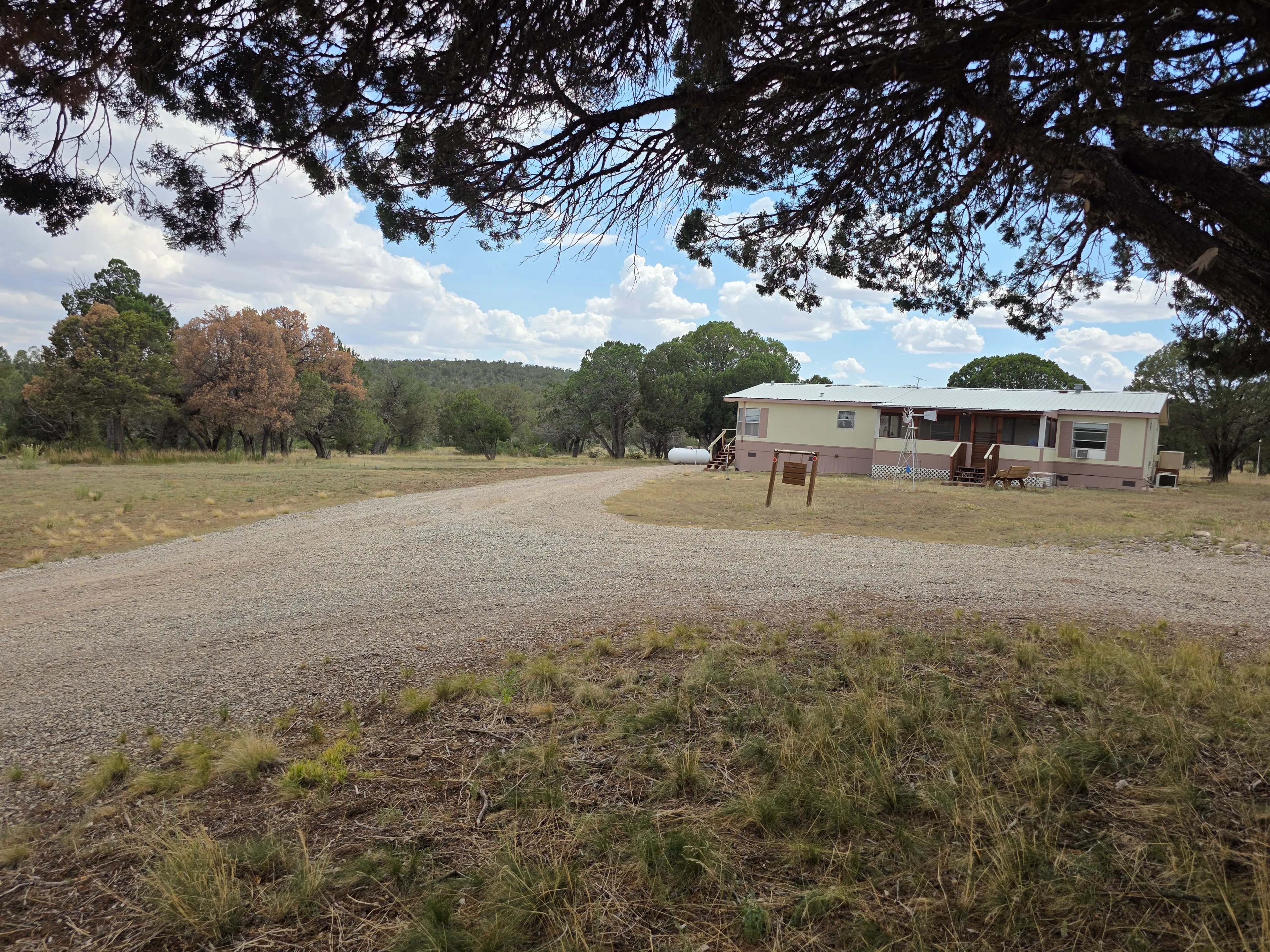 Manufactured home with gravel driveway