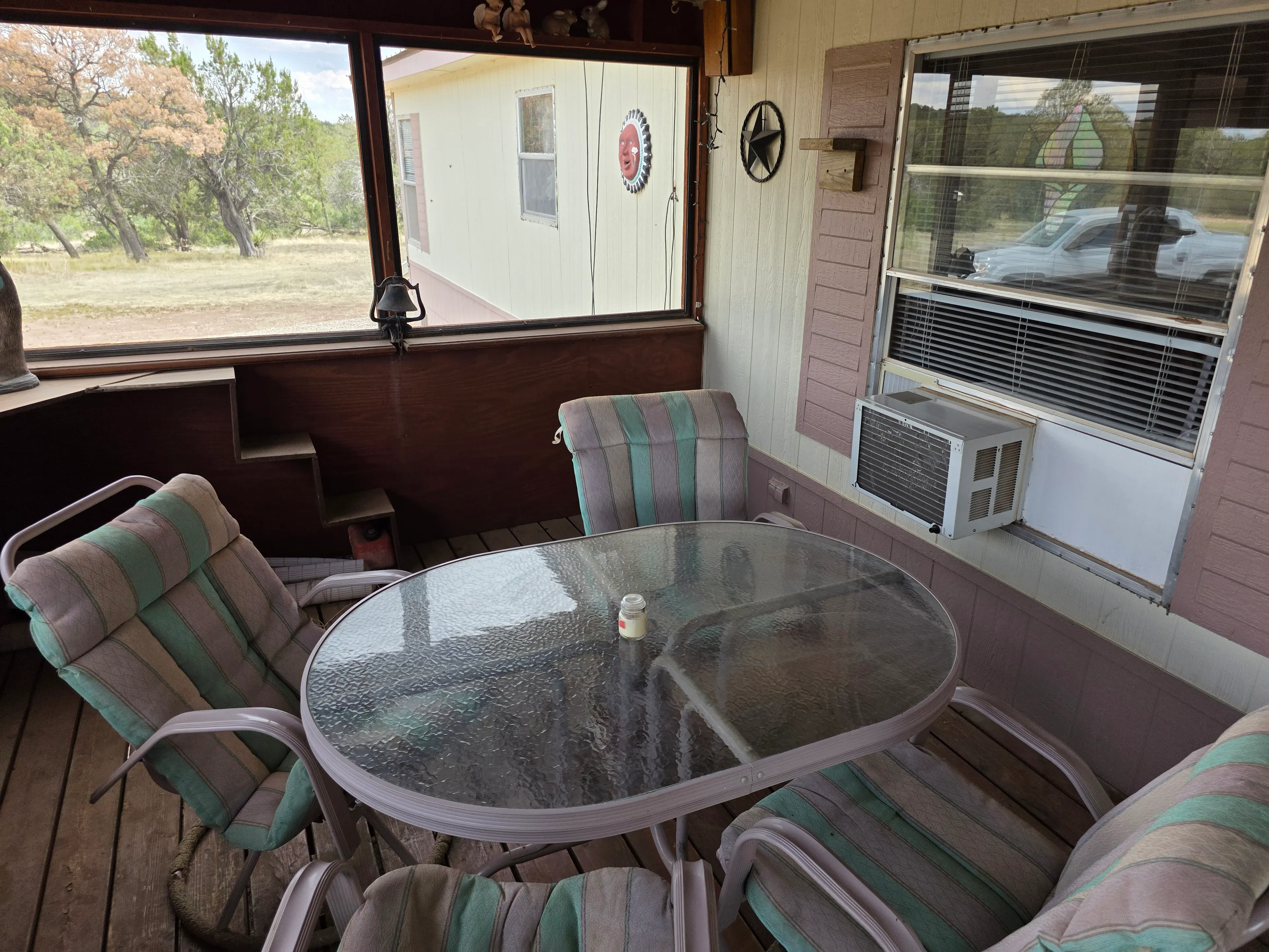 Screened porch table and chairs