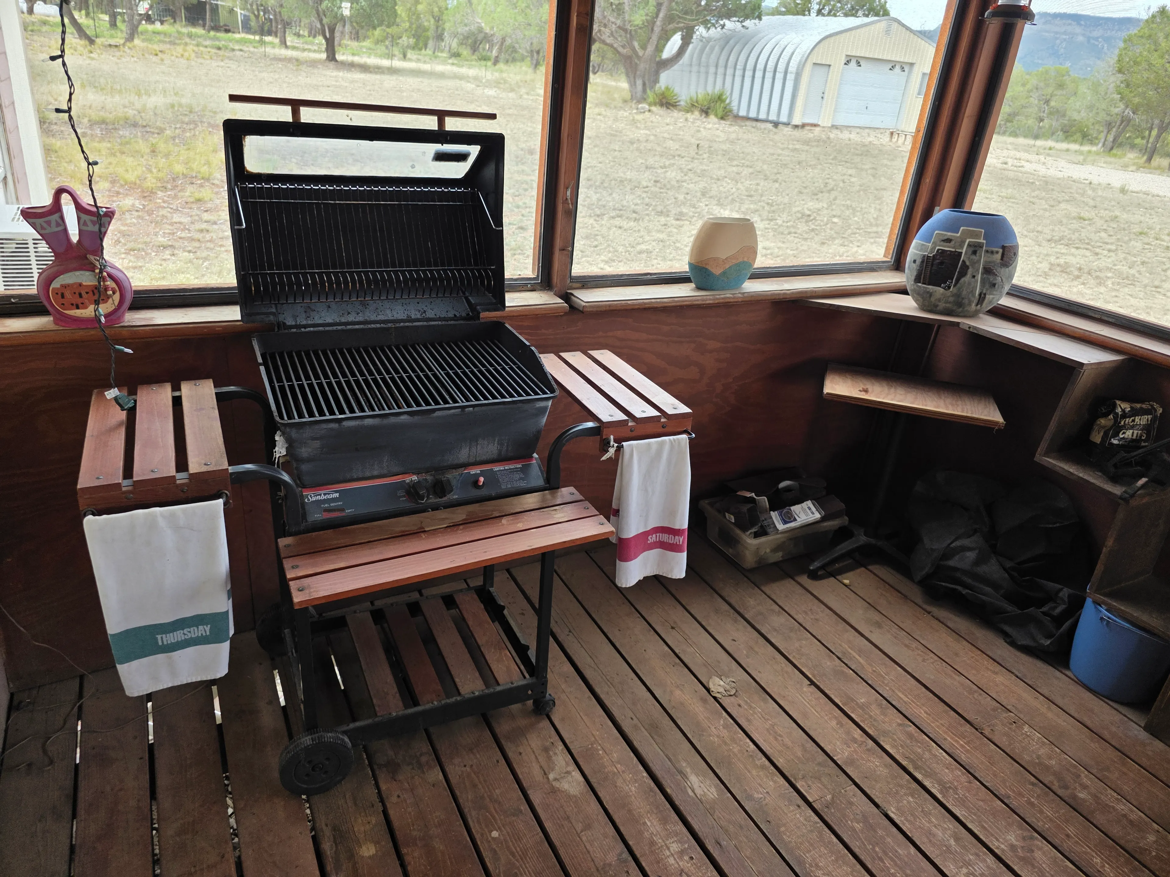 Gas grill on screened porch