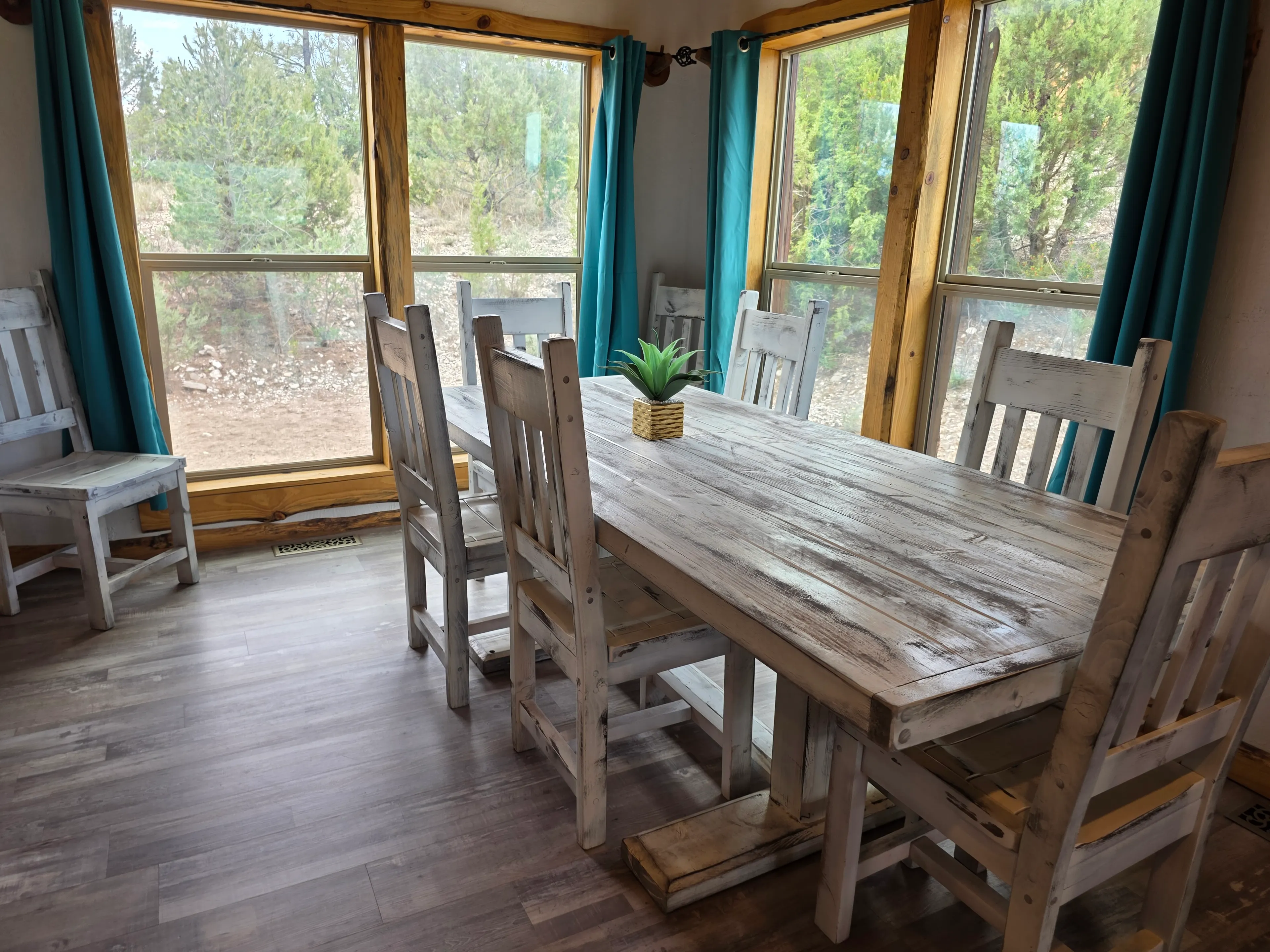 farmhouse dining table by windows