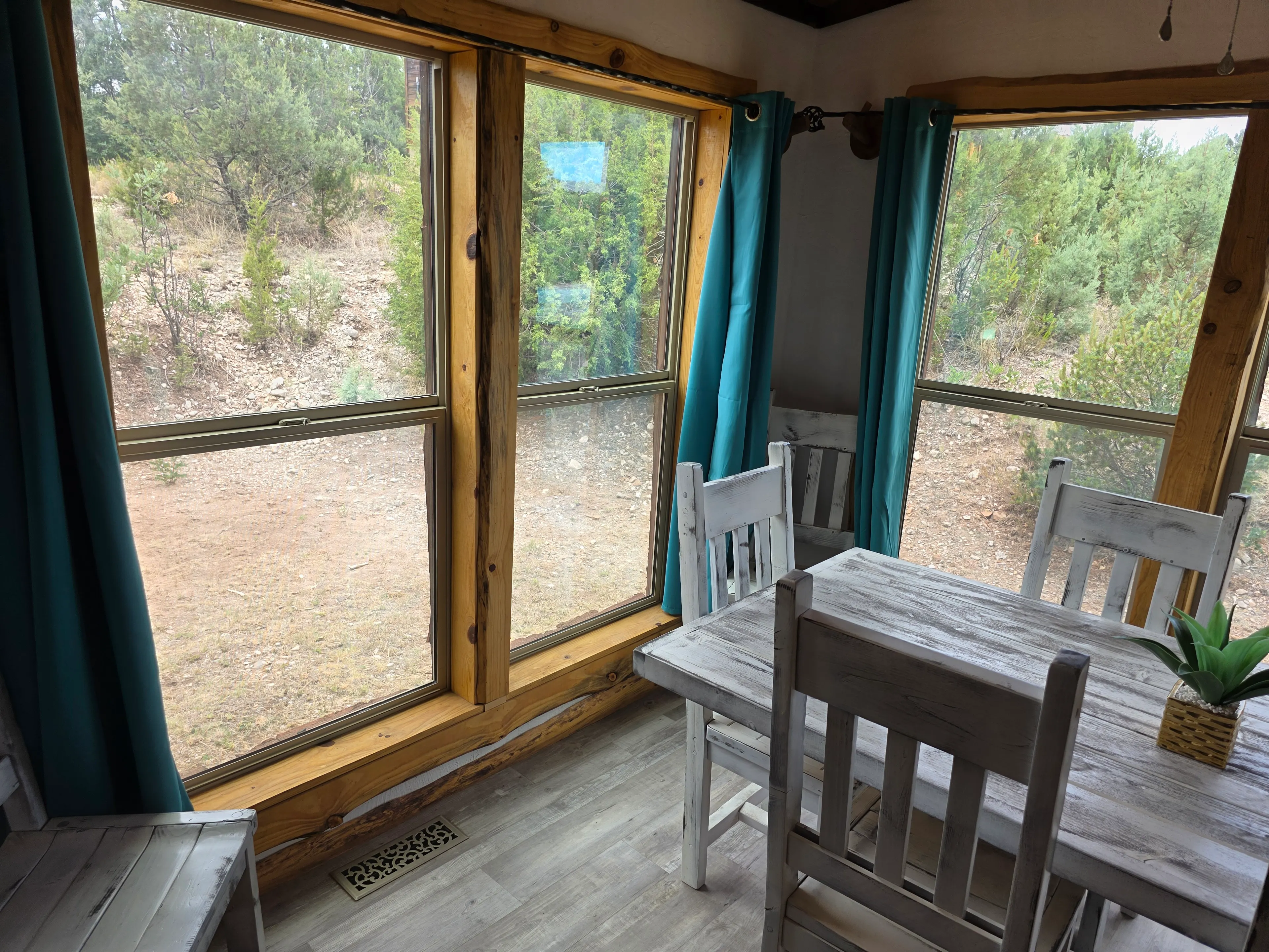 dining table in windowed corner