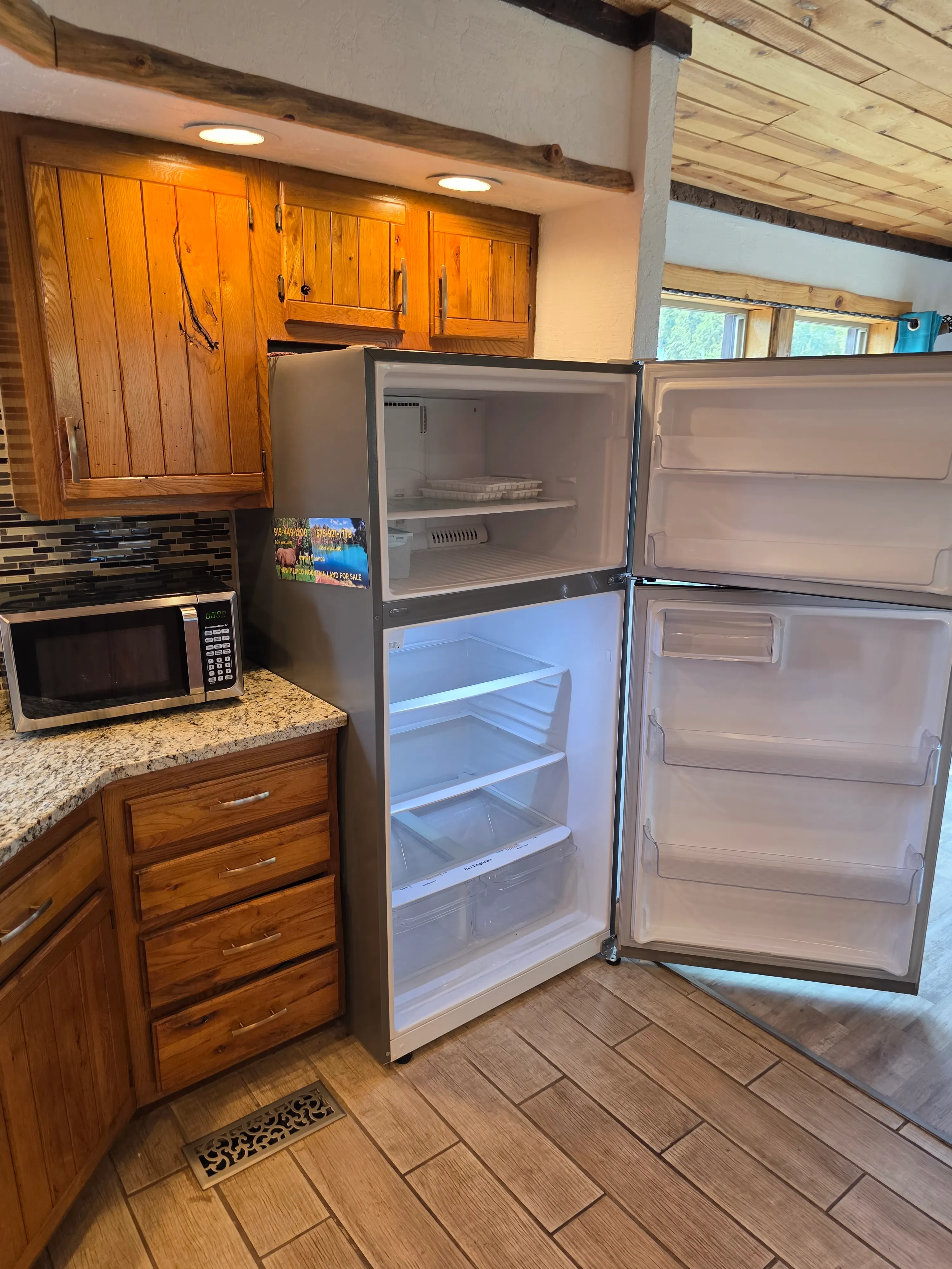clean empty refrigerator standing open