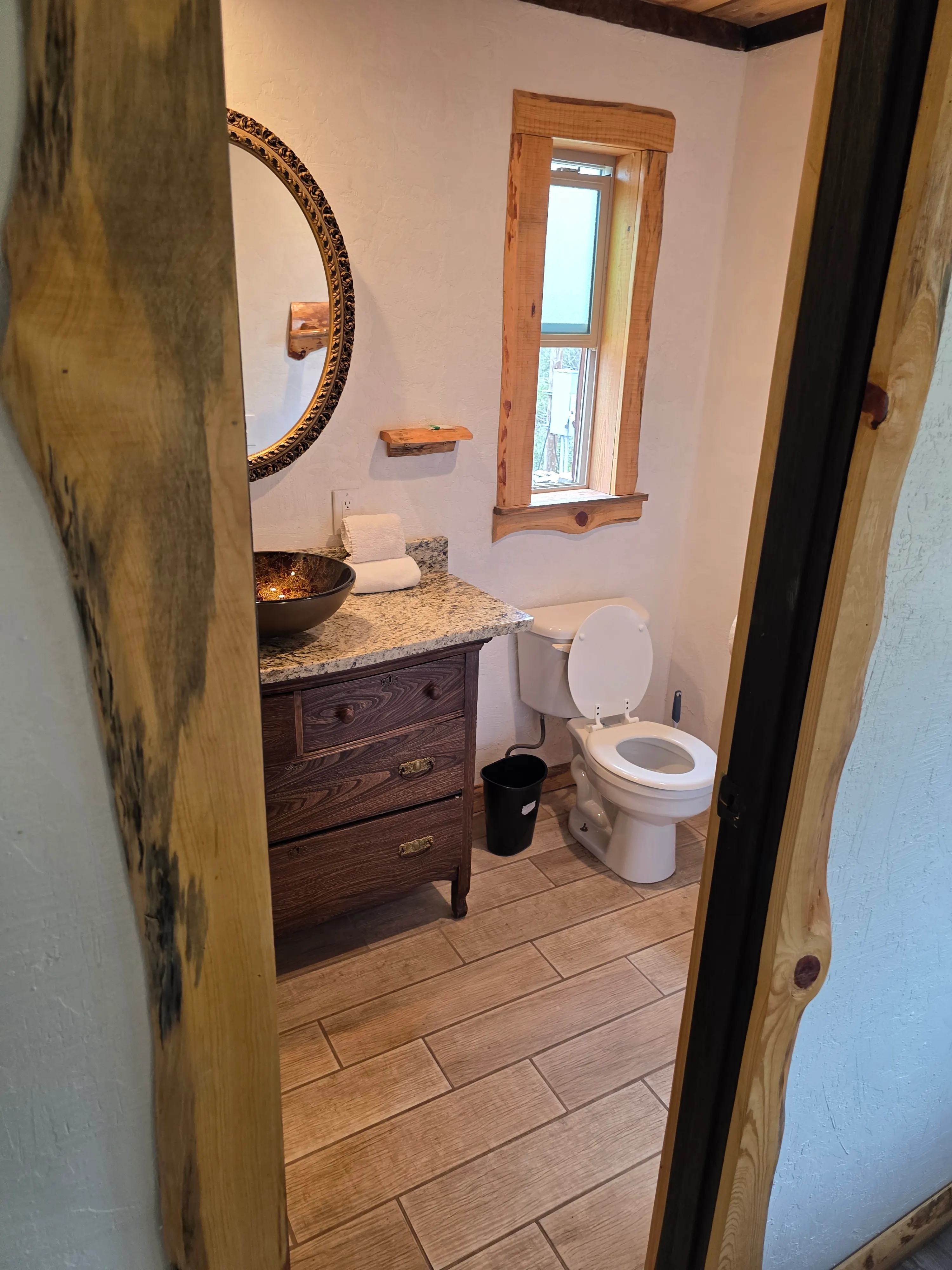 bathroom with dresser-style vanity
