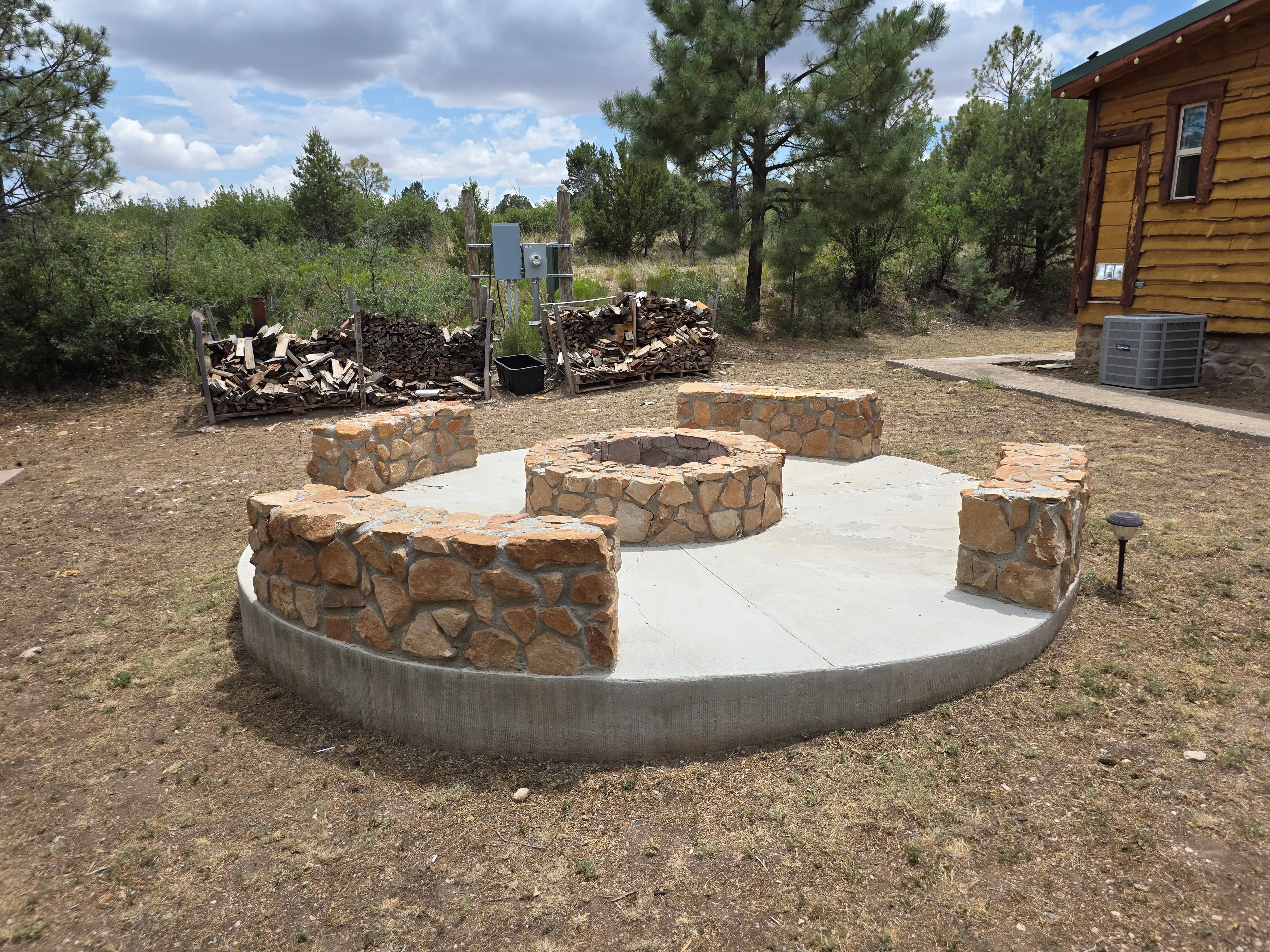 stone fire pit with seating circle