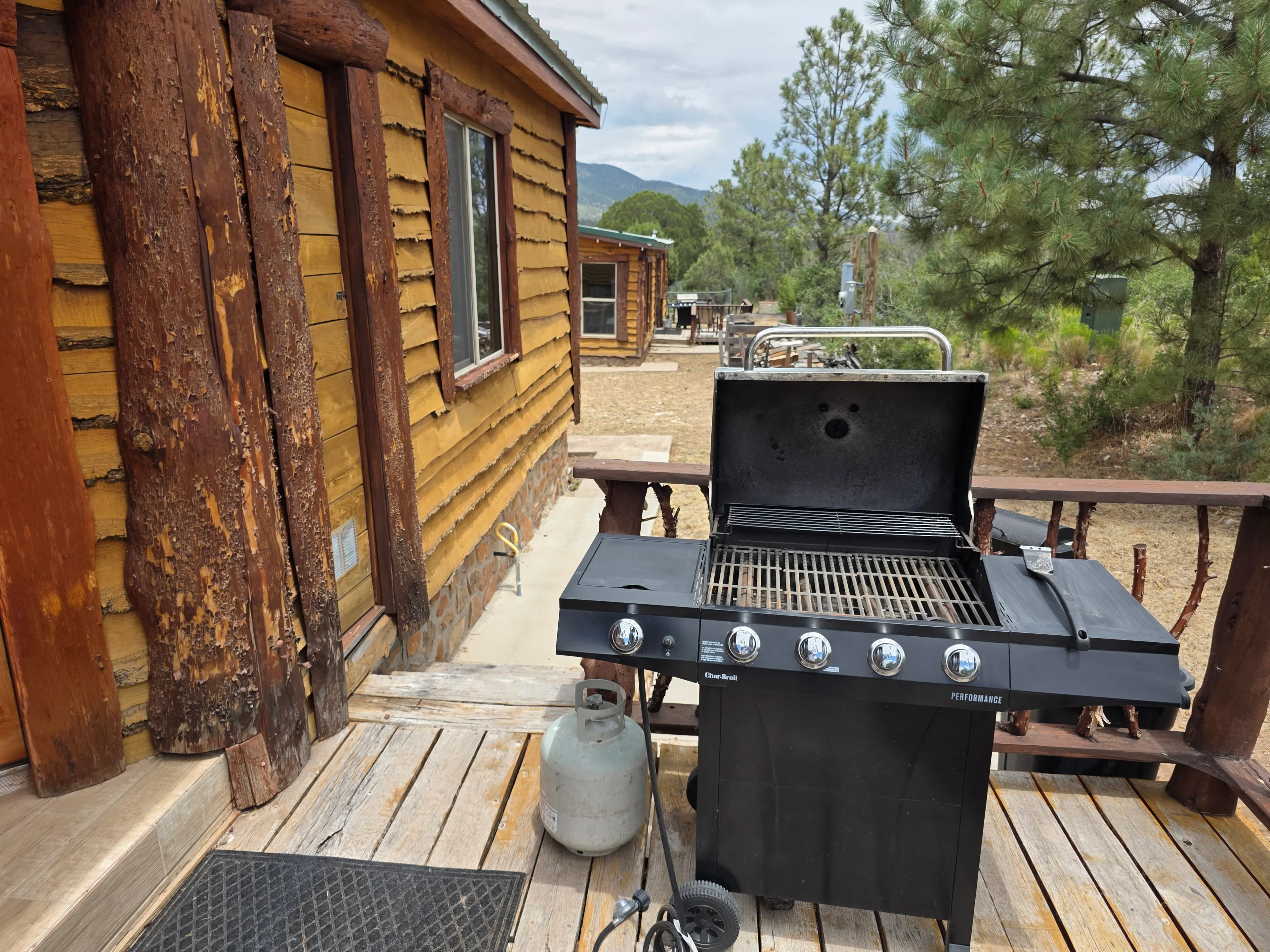 gas grill open on deck