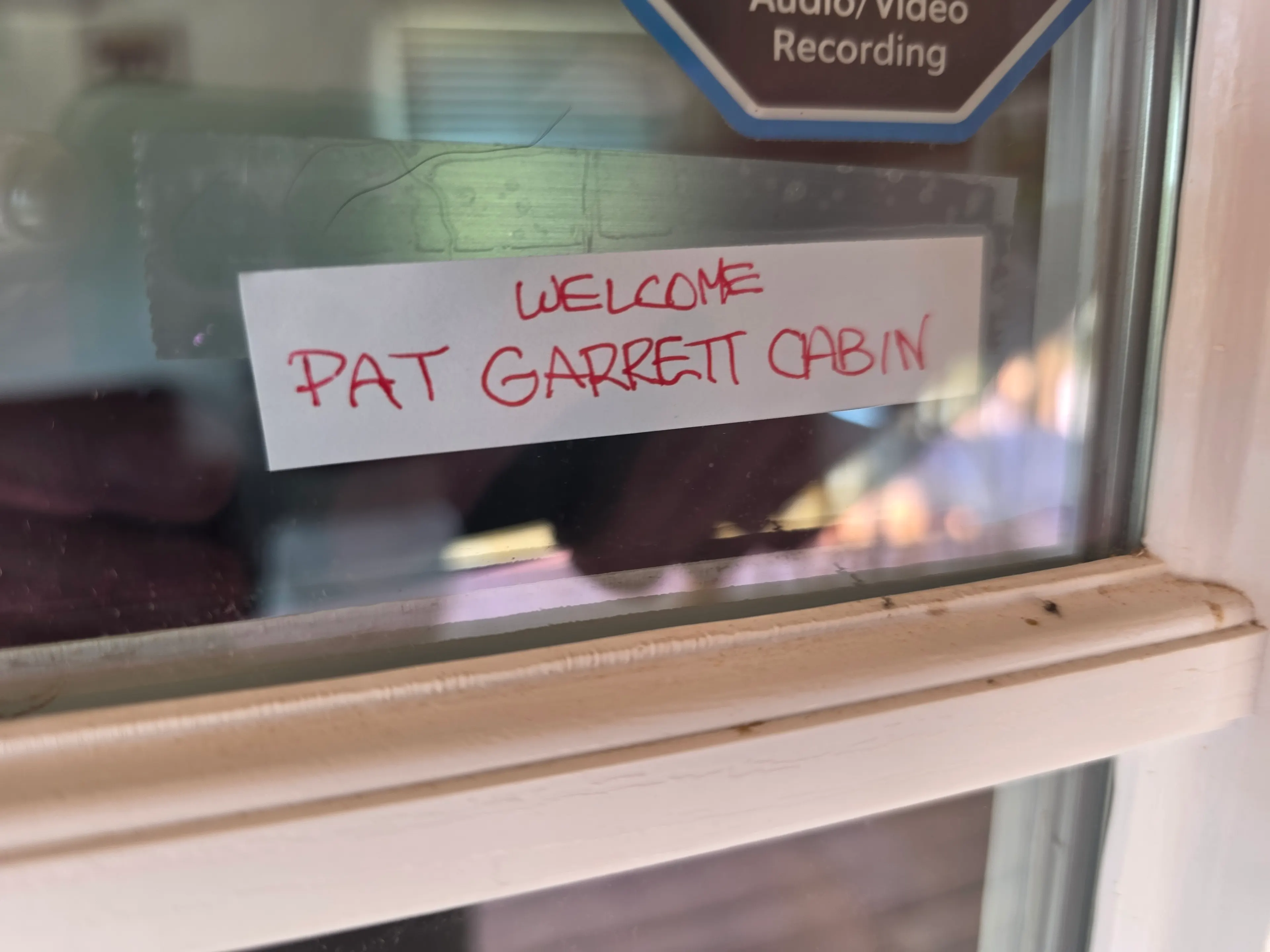 handwritten Pat Garrett Cabin welcome sign
