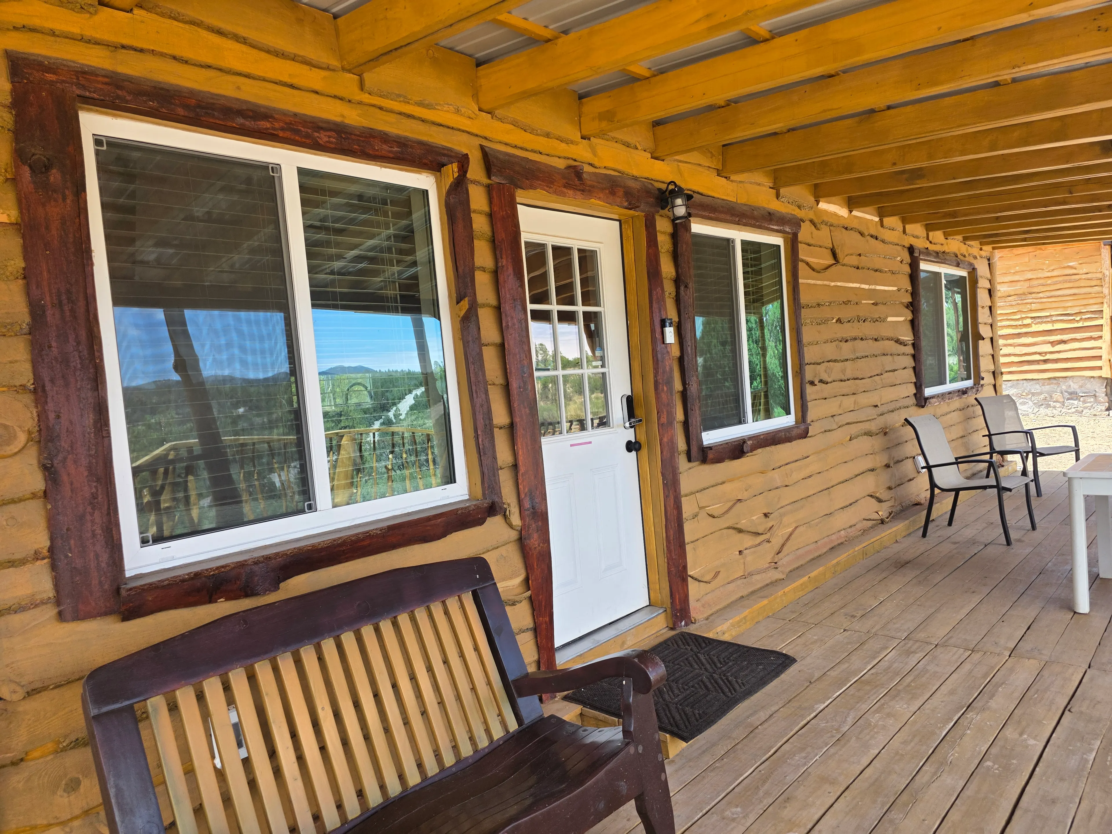 front porch bench and entry door