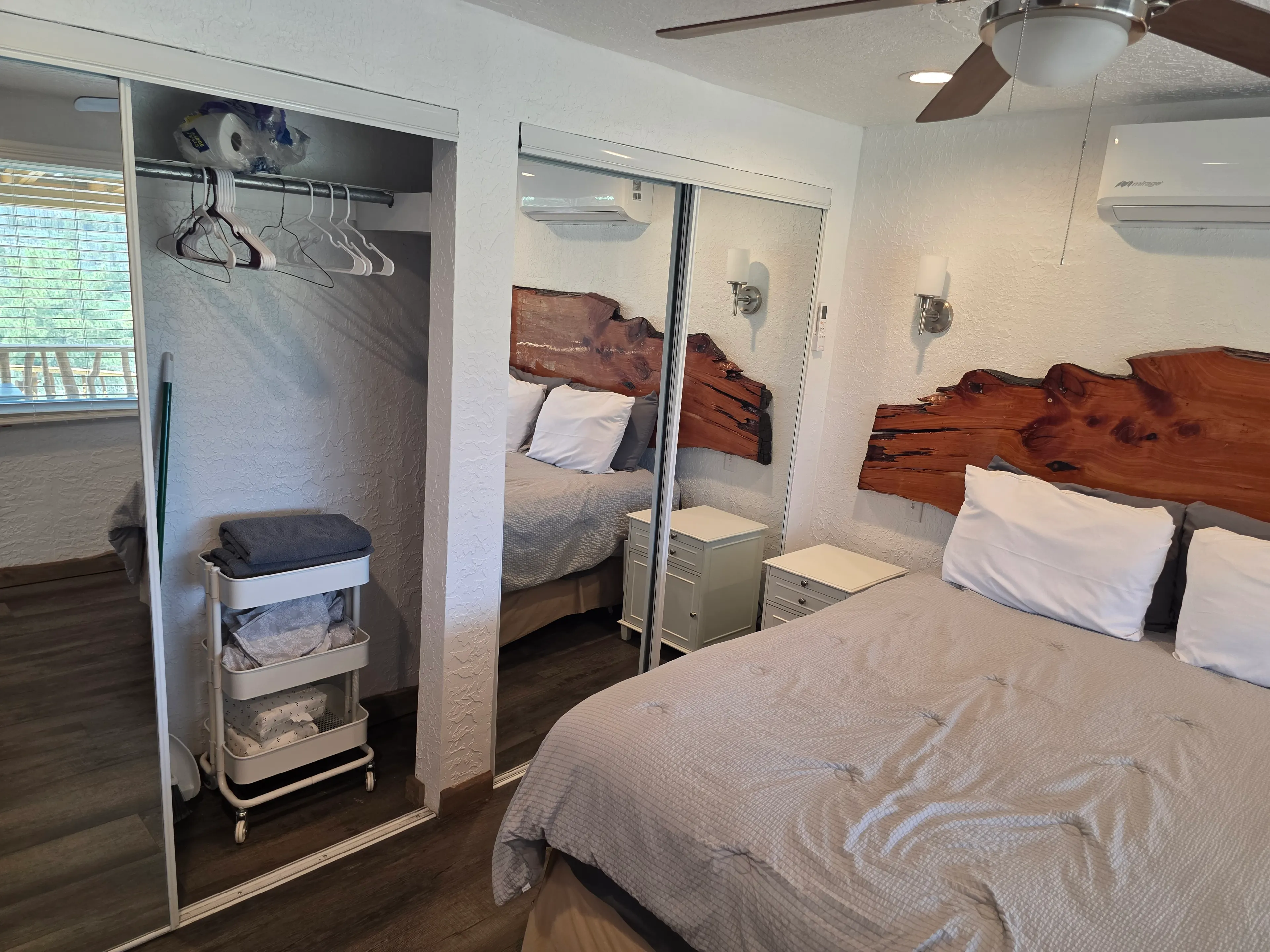 bedroom with closet and mirrored doors