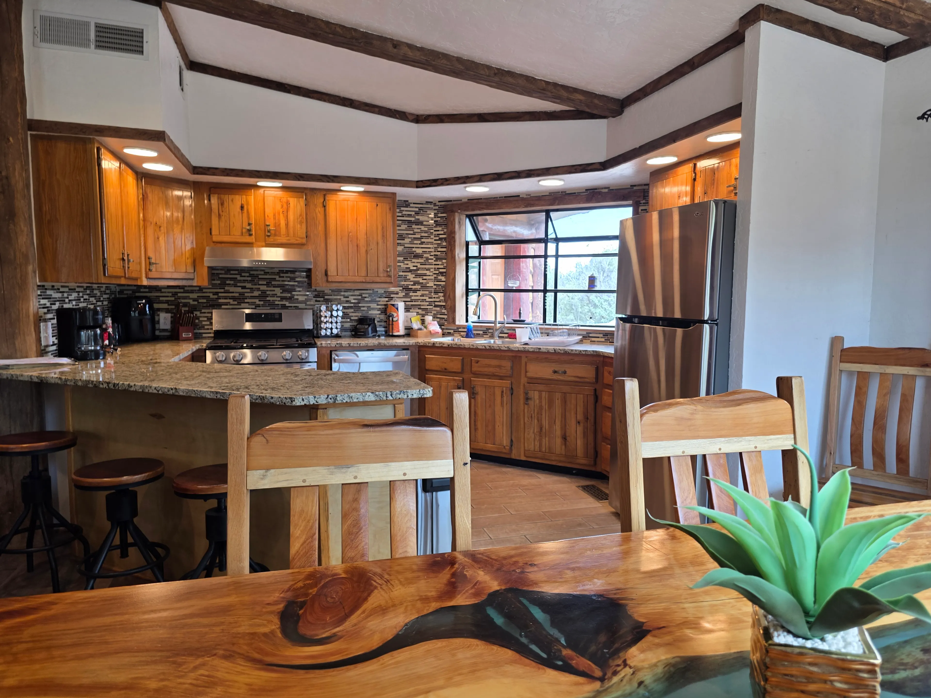 open kitchen with breakfast bar