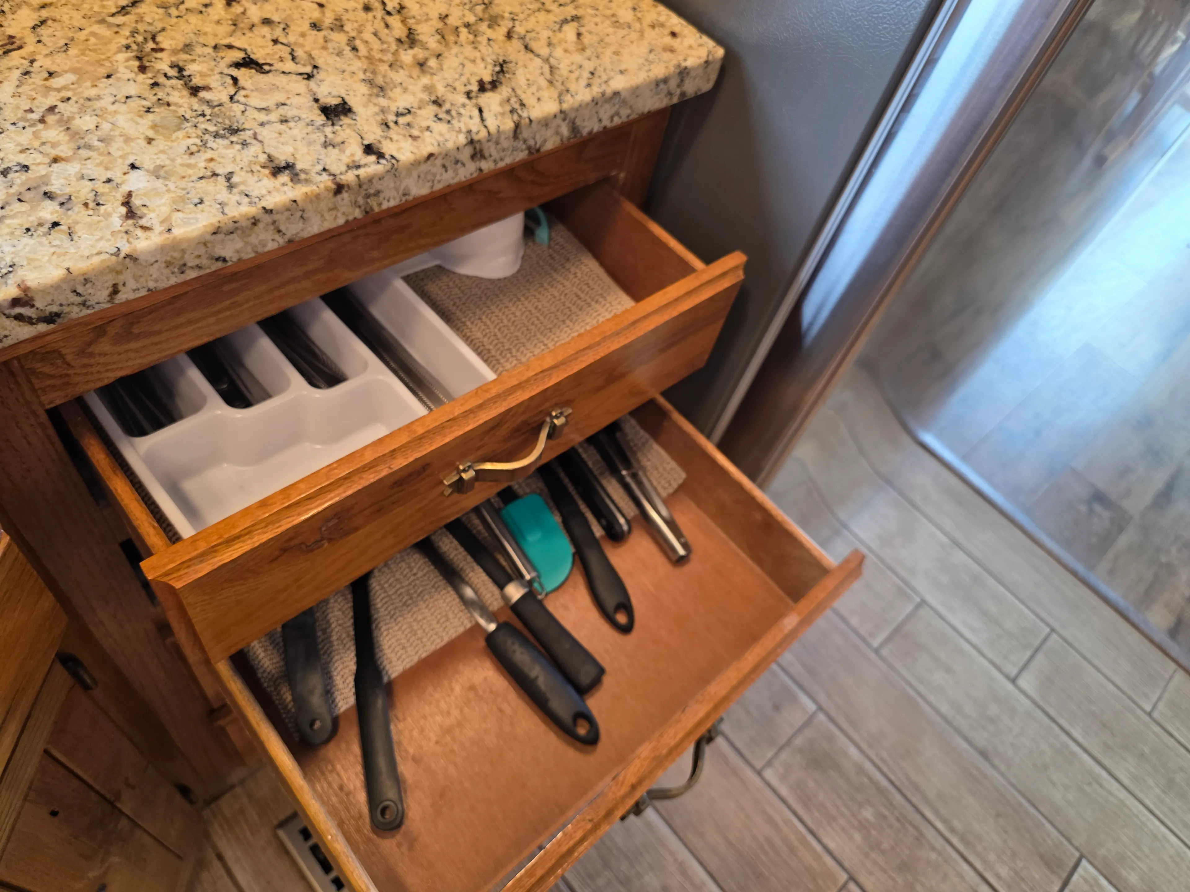 open drawers with utensils
