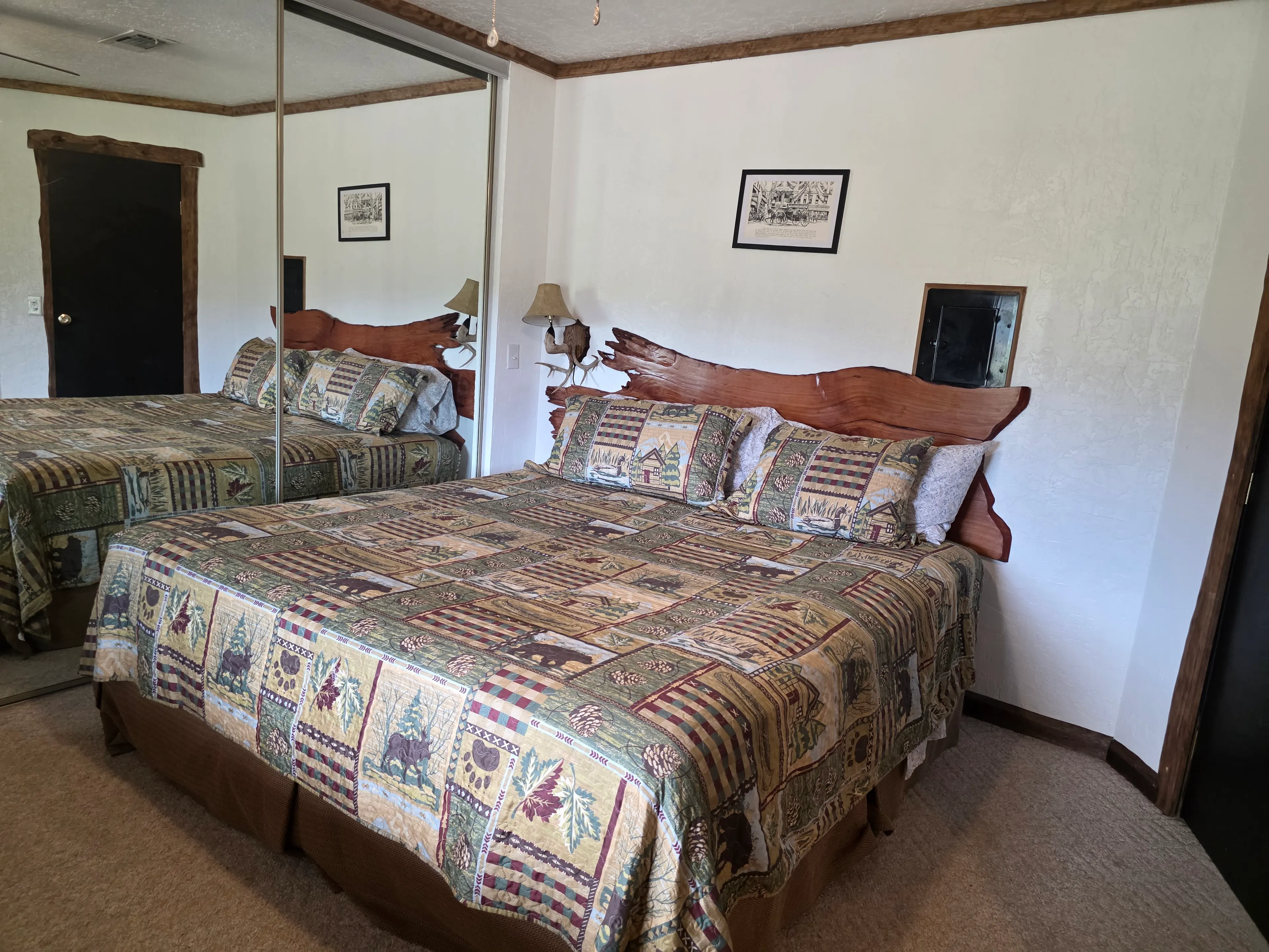 king bed with mirrored closet