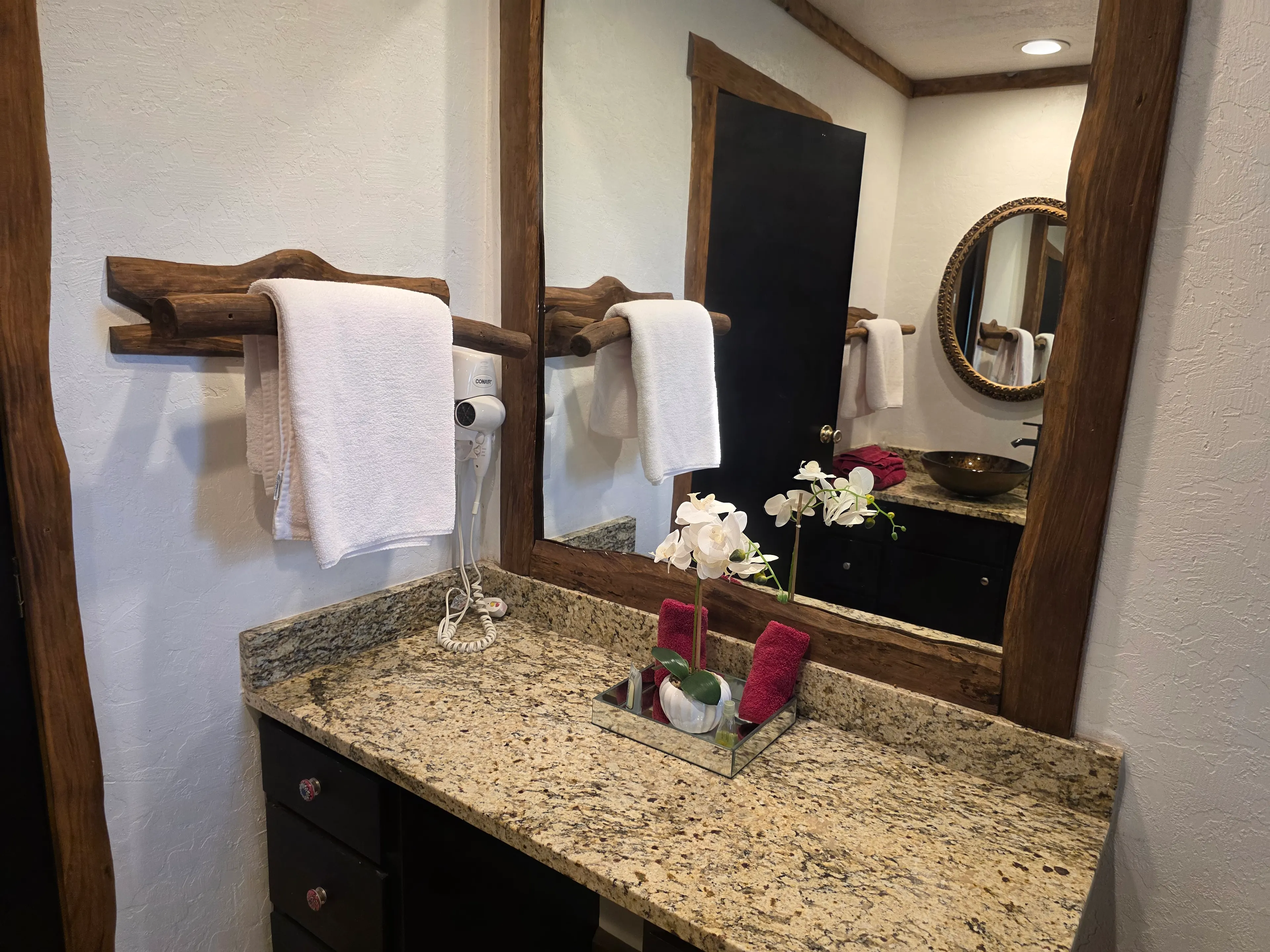 granite vanity with towels
