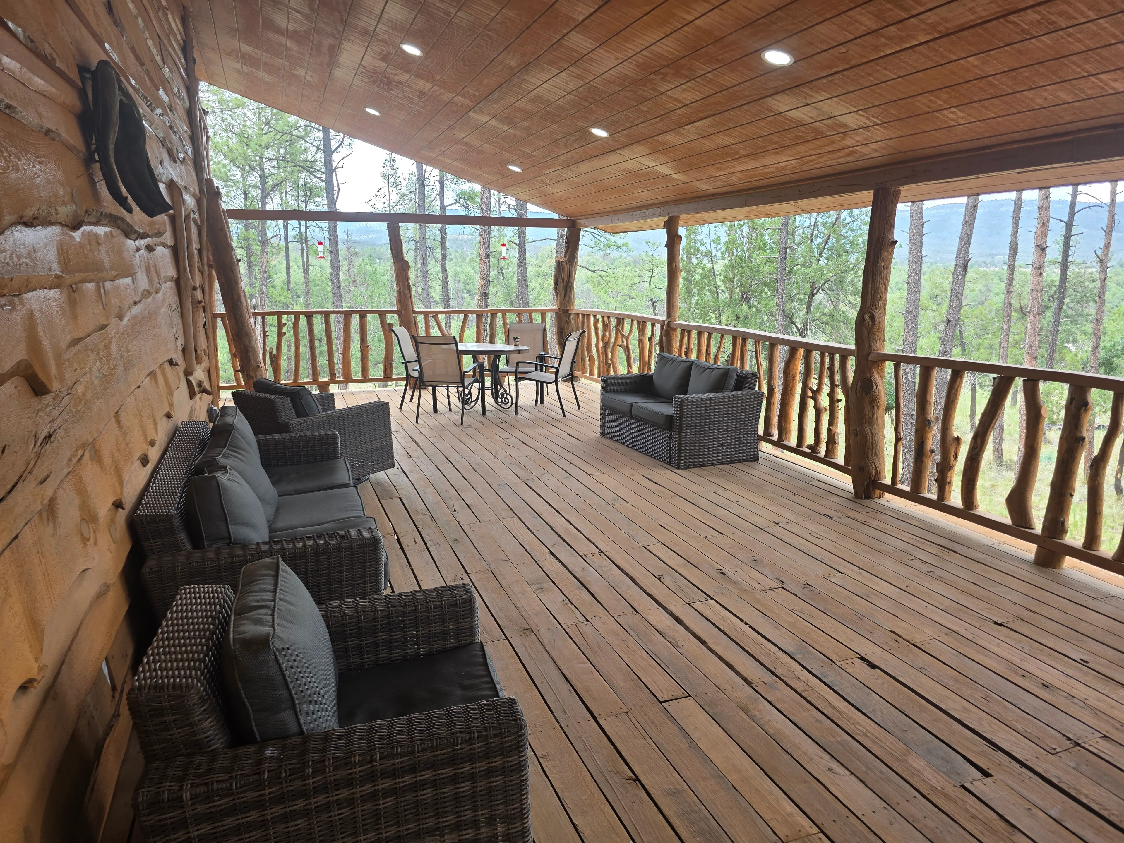 large covered deck, mountain views