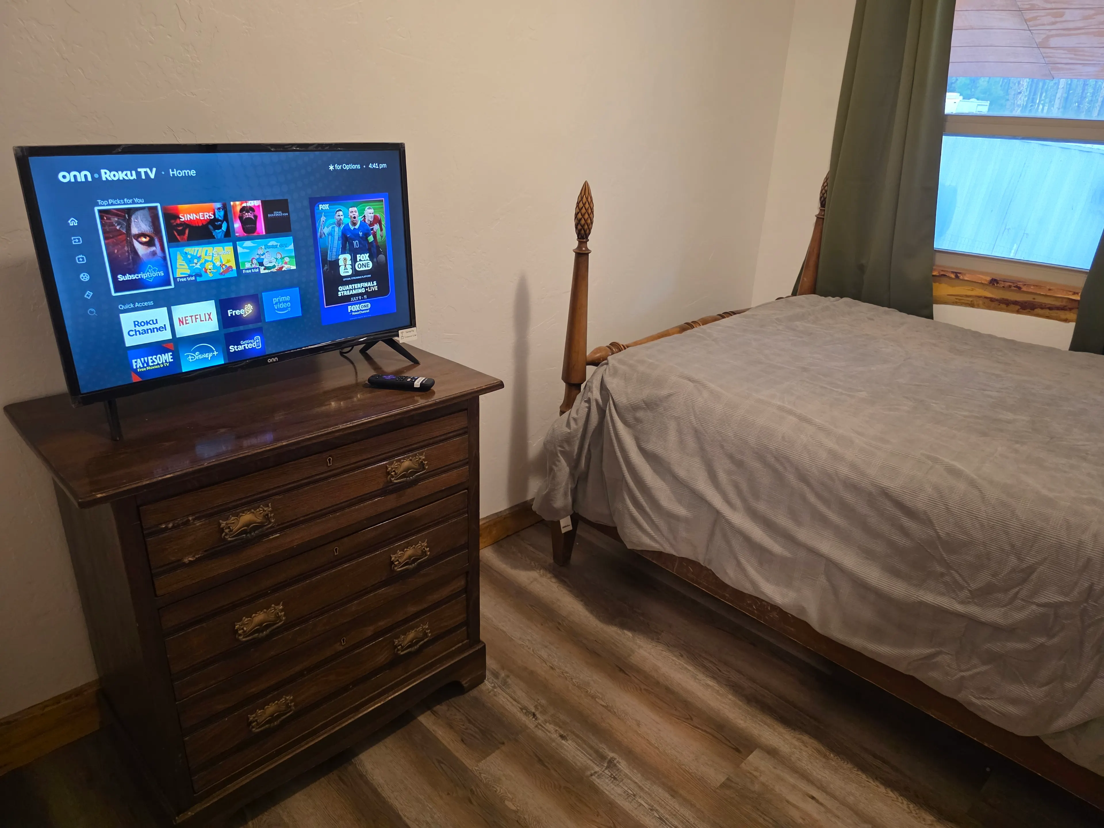 bedroom with TV on dresser