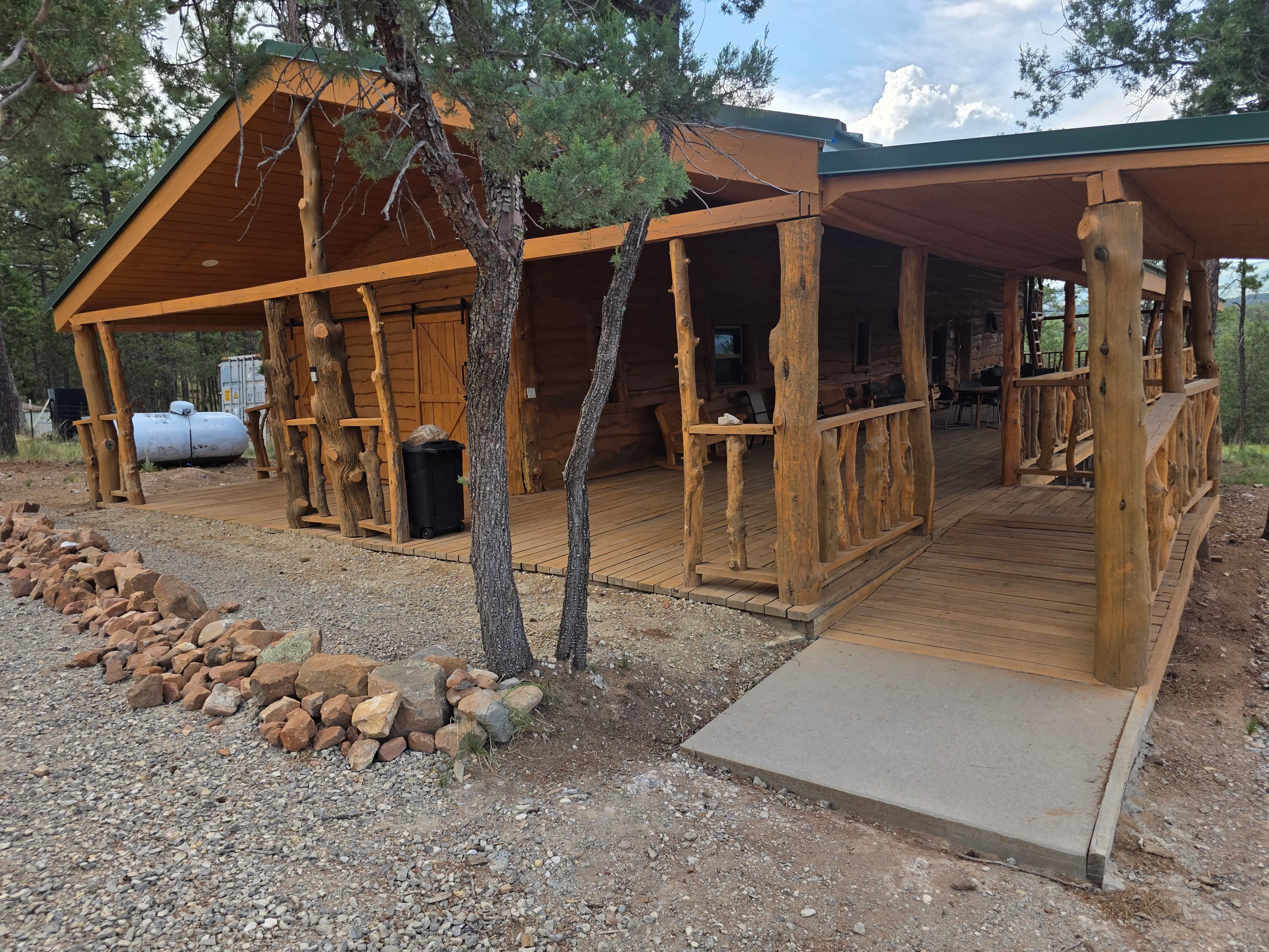 log cabin front with porch