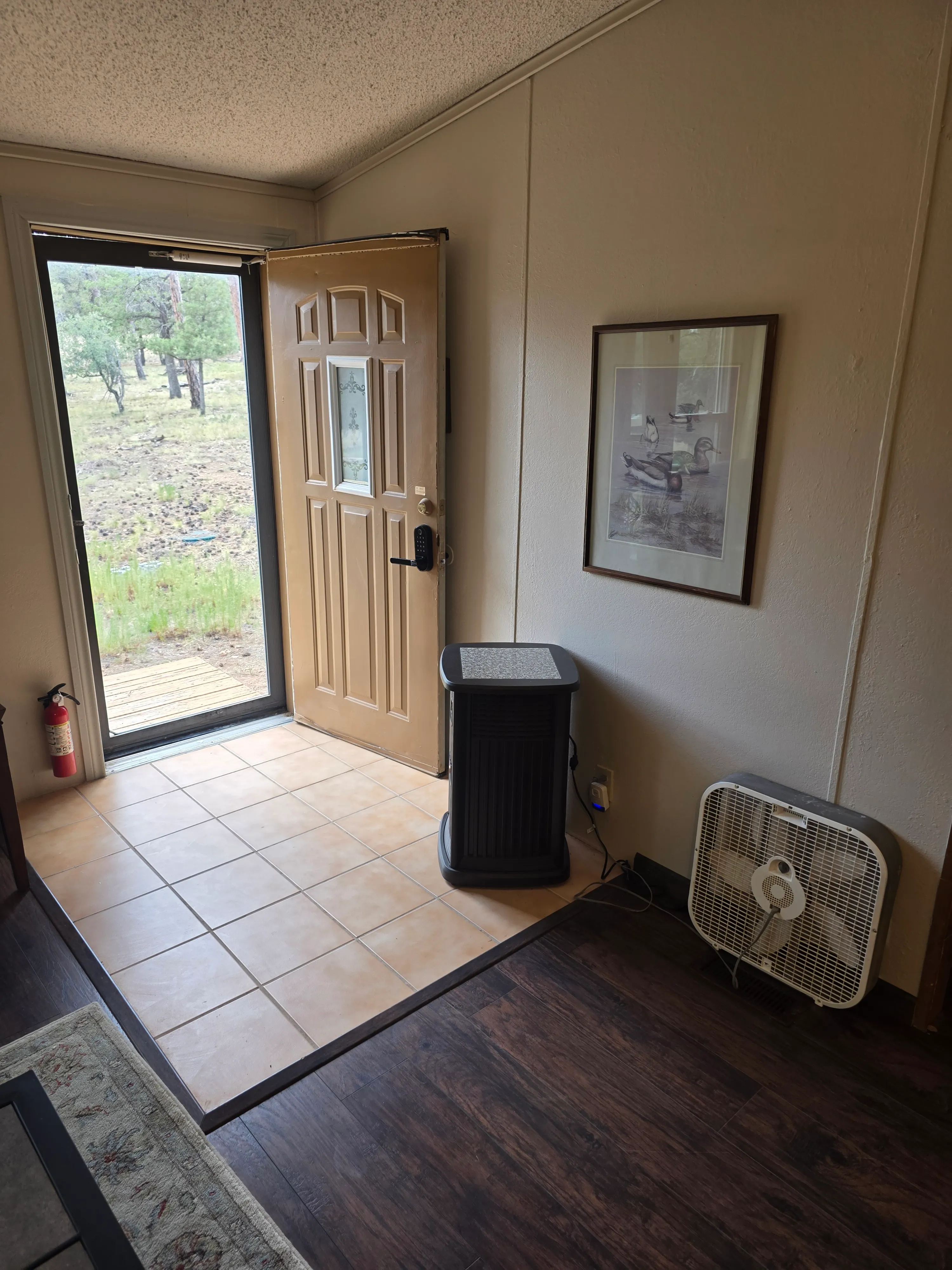 tiled entry foyer, door open