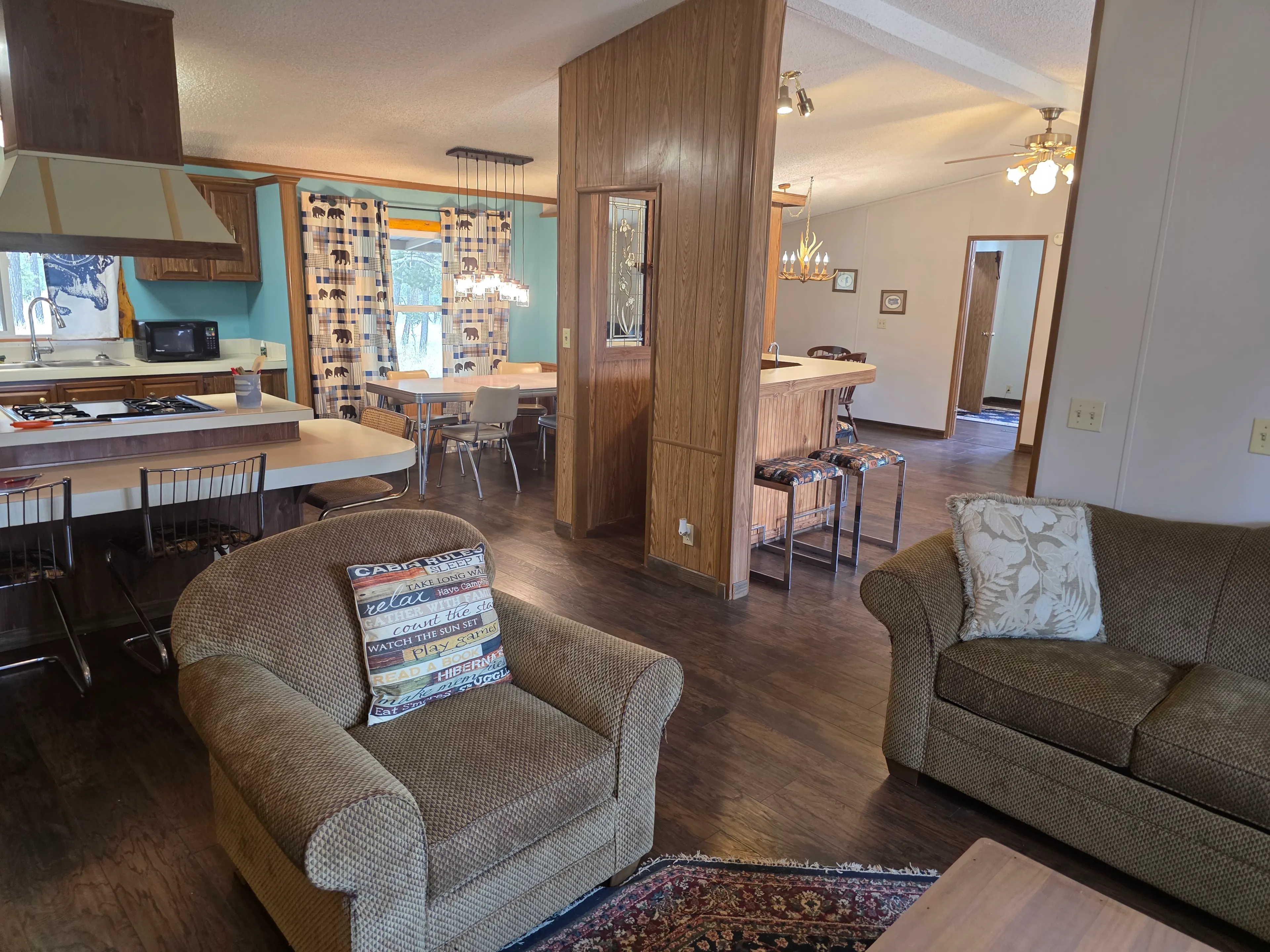 living area toward dining and kitchen