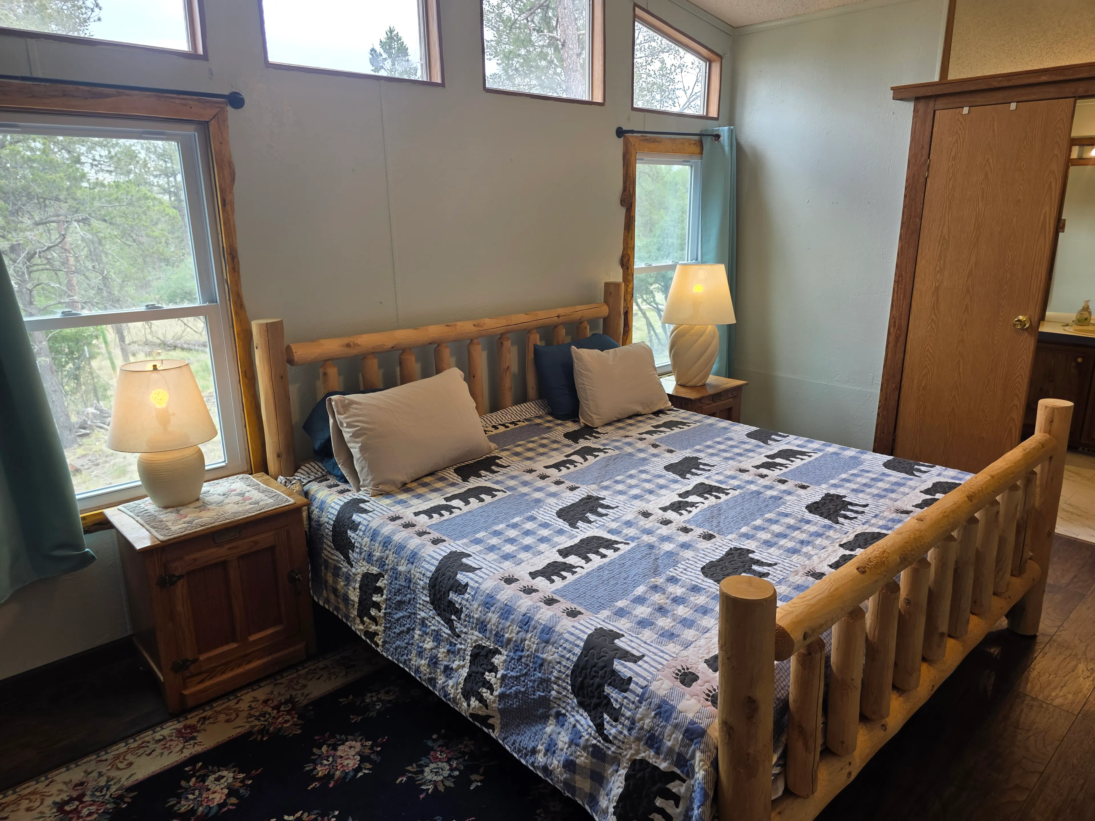king bedroom with bear quilt