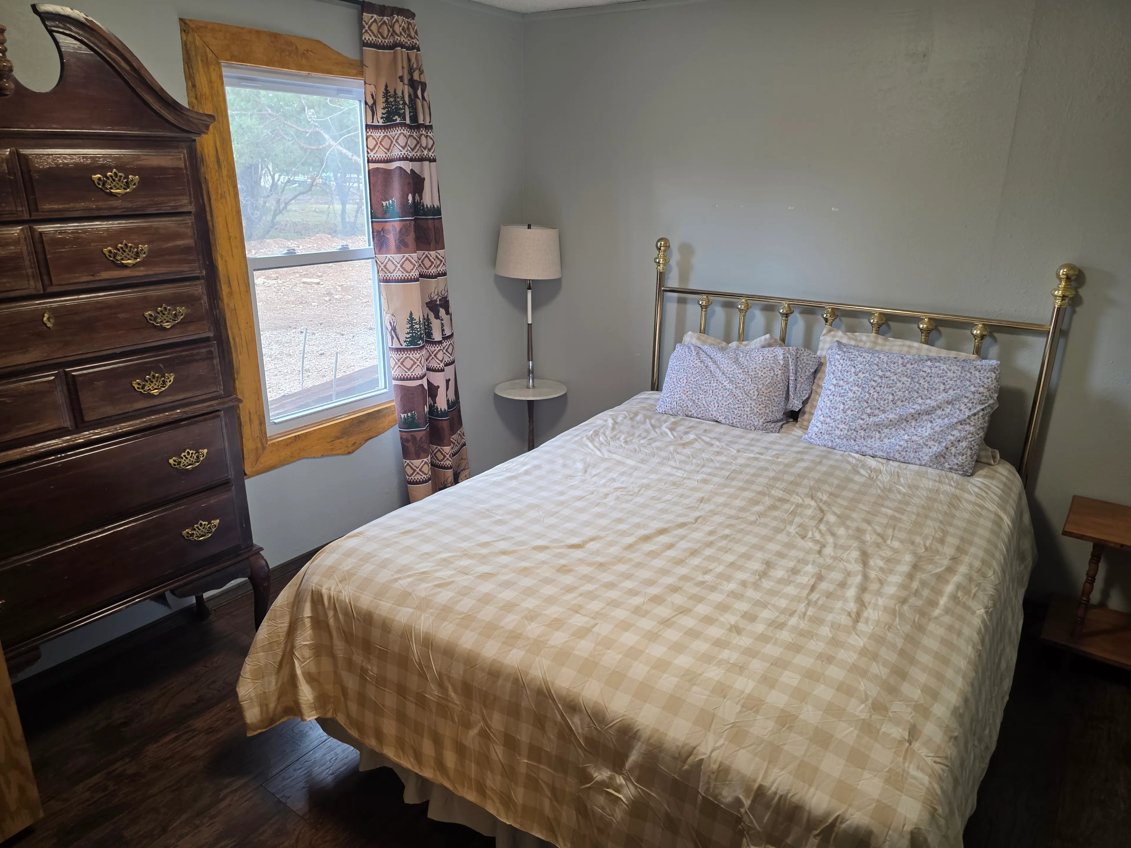 brass queen bed, tall dresser